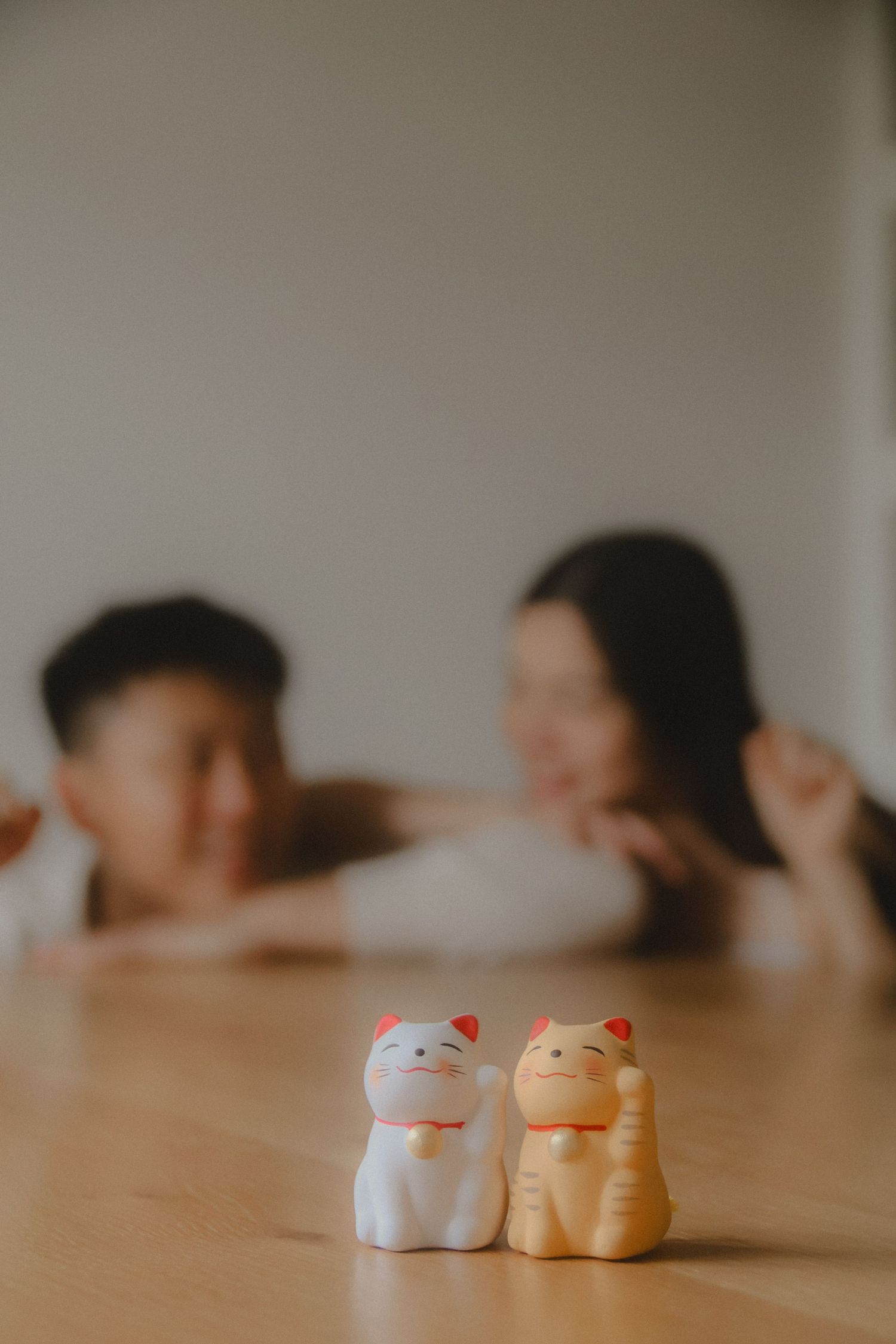 In-home couple photoshoot in Singapore with warm, natural light and storytelling focus