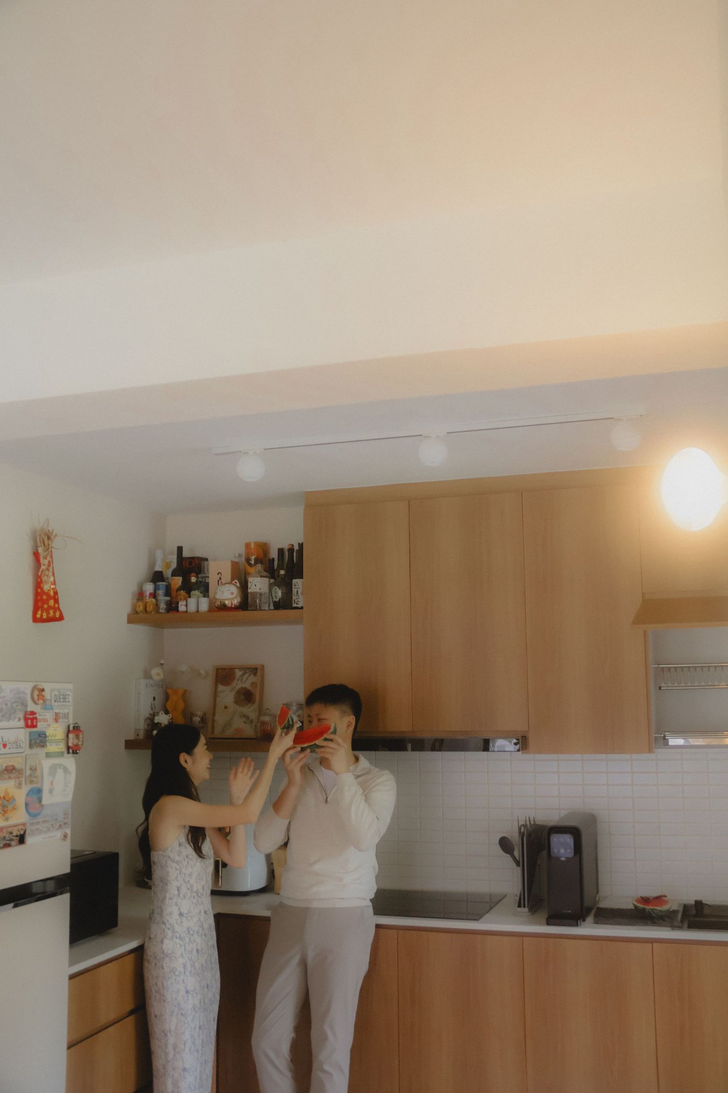 In-home couple photoshoot in Singapore with warm, natural light and storytelling focus