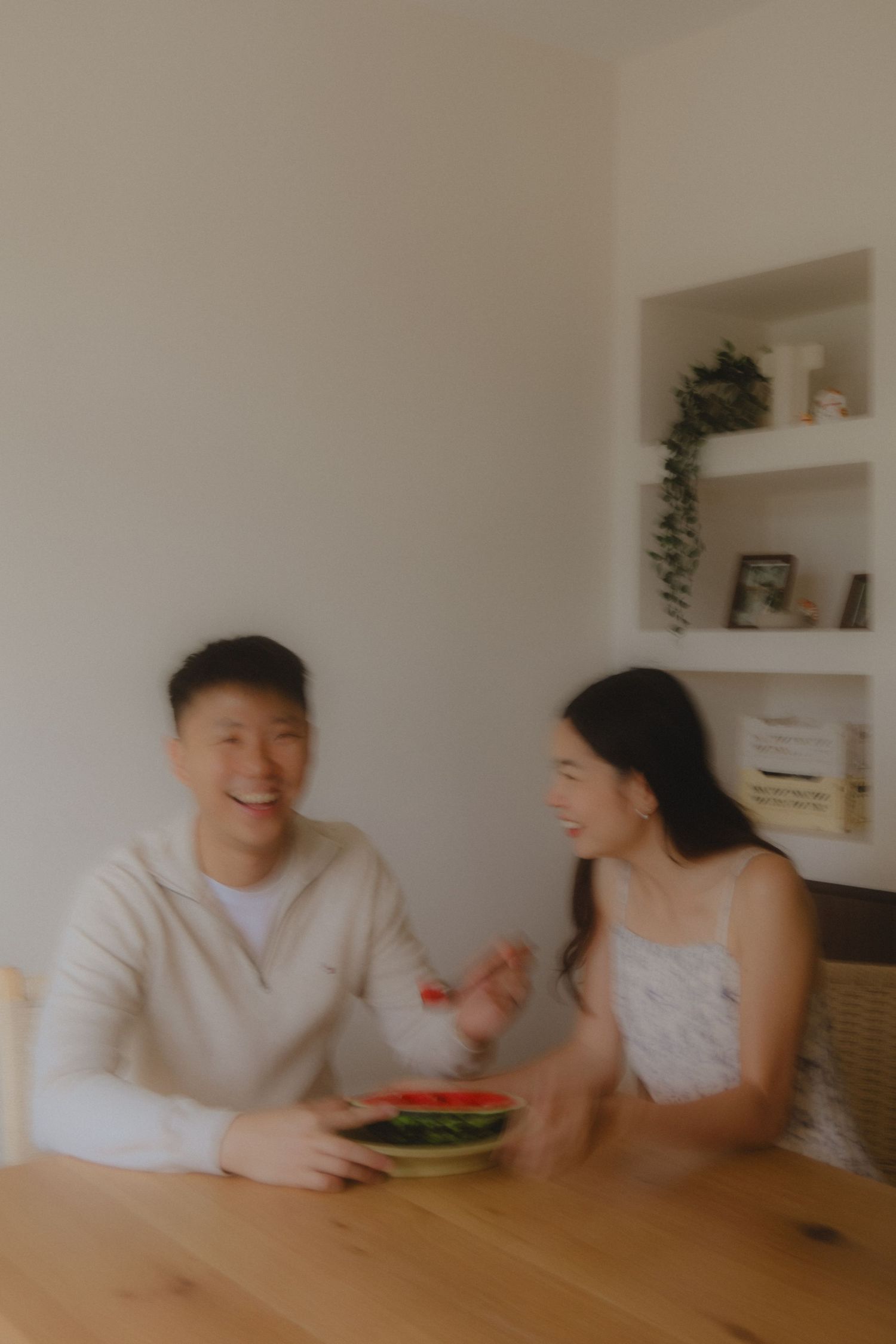 In-home couple photoshoot in Singapore with warm, natural light and storytelling focus