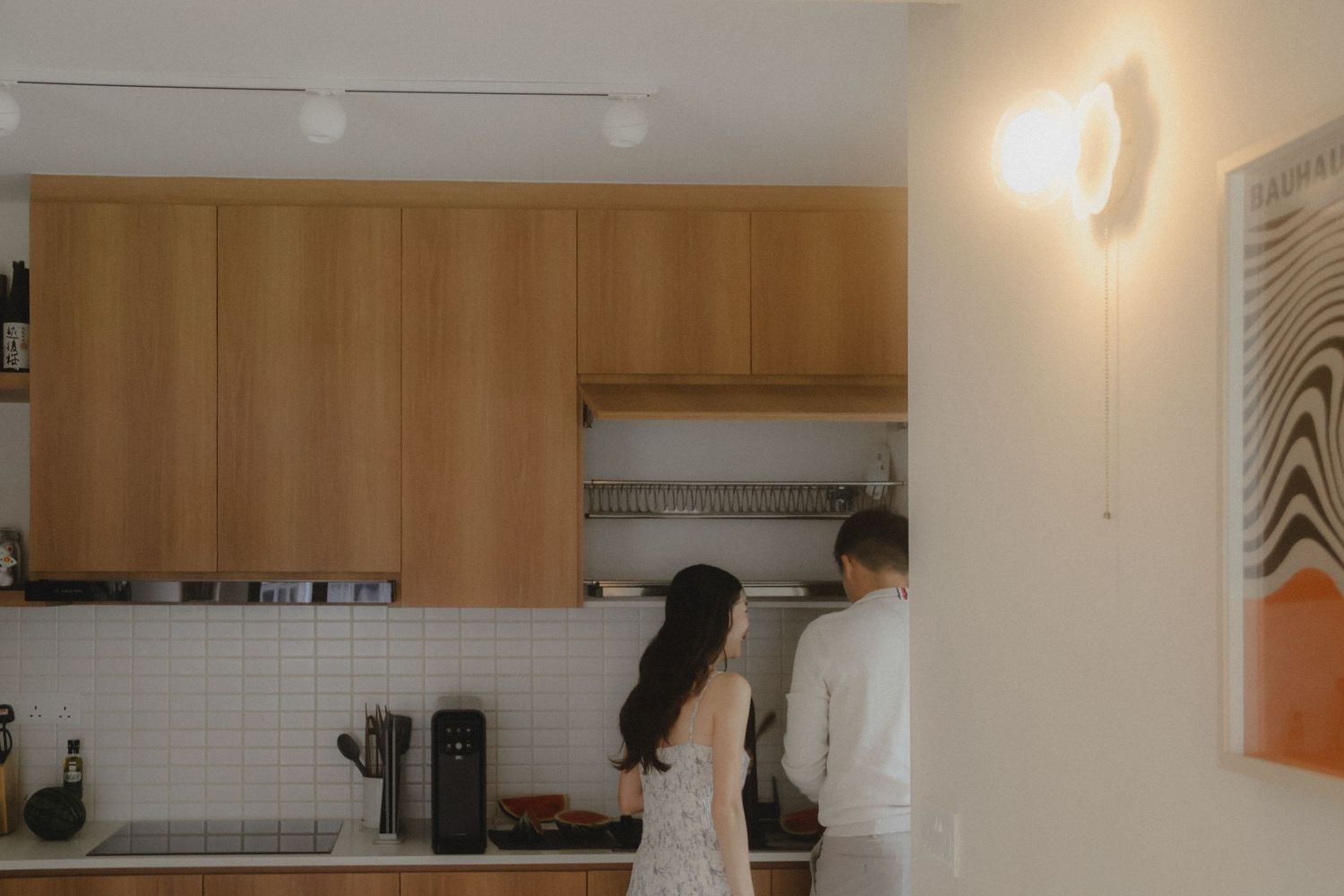 In-home couple photoshoot in Singapore with warm, natural light and storytelling focus