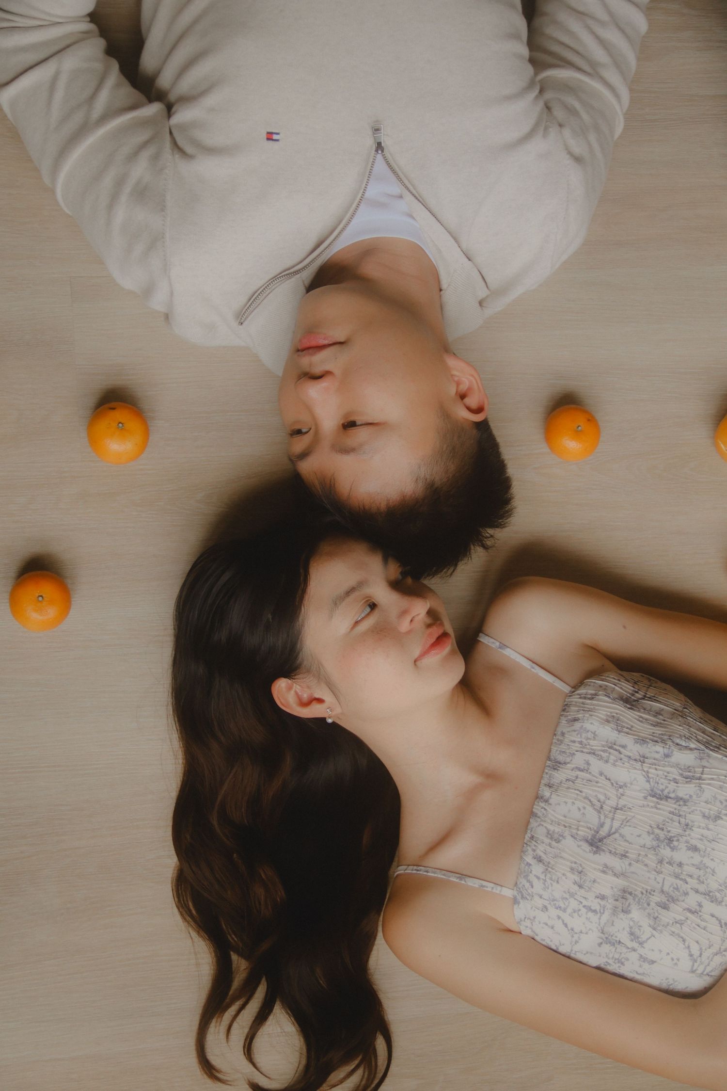 In-home couple photoshoot in Singapore with warm, natural light and storytelling focus