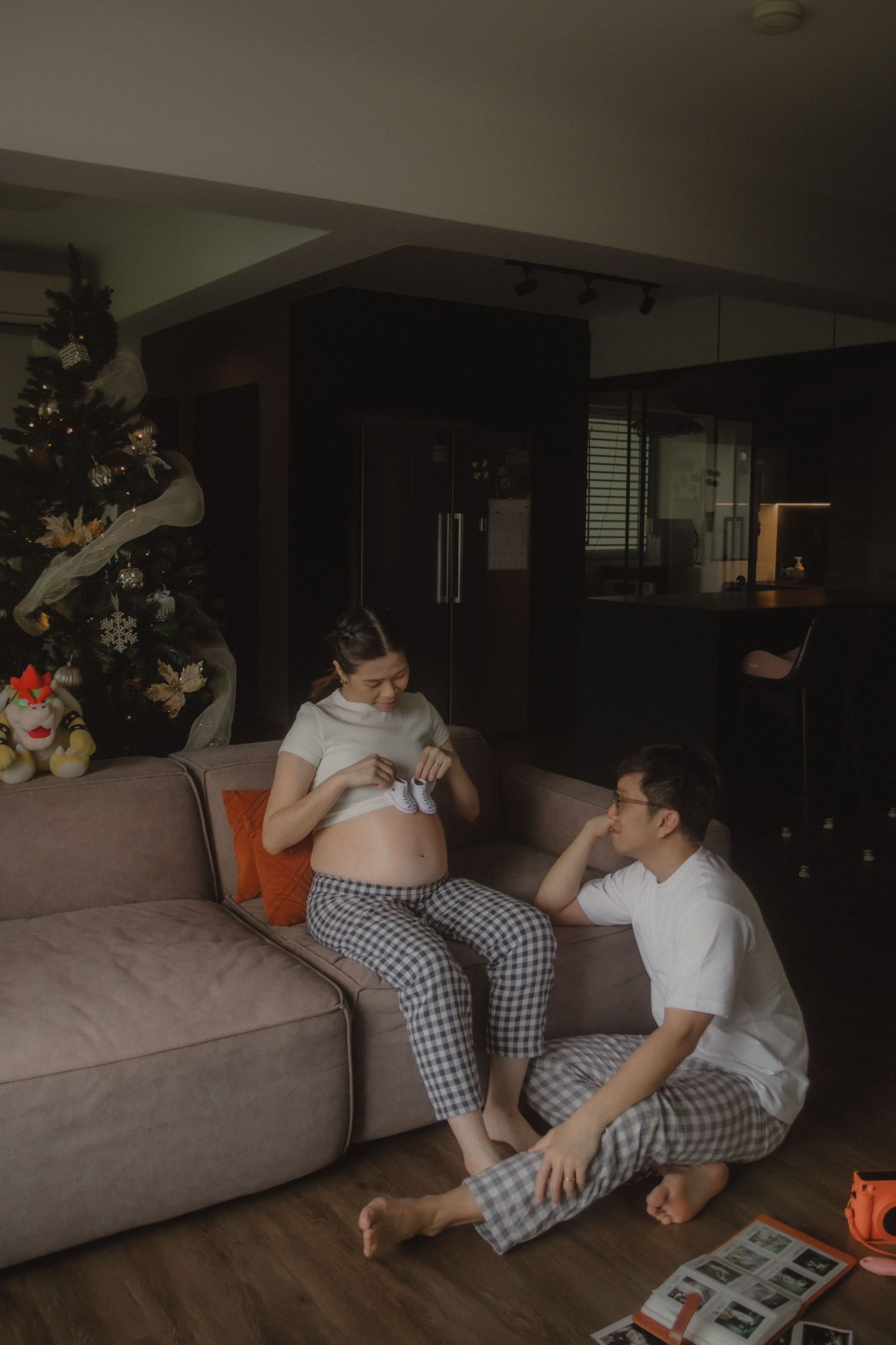 in-home maternity portrait photography in Singapore with natural light and emotional storytelling