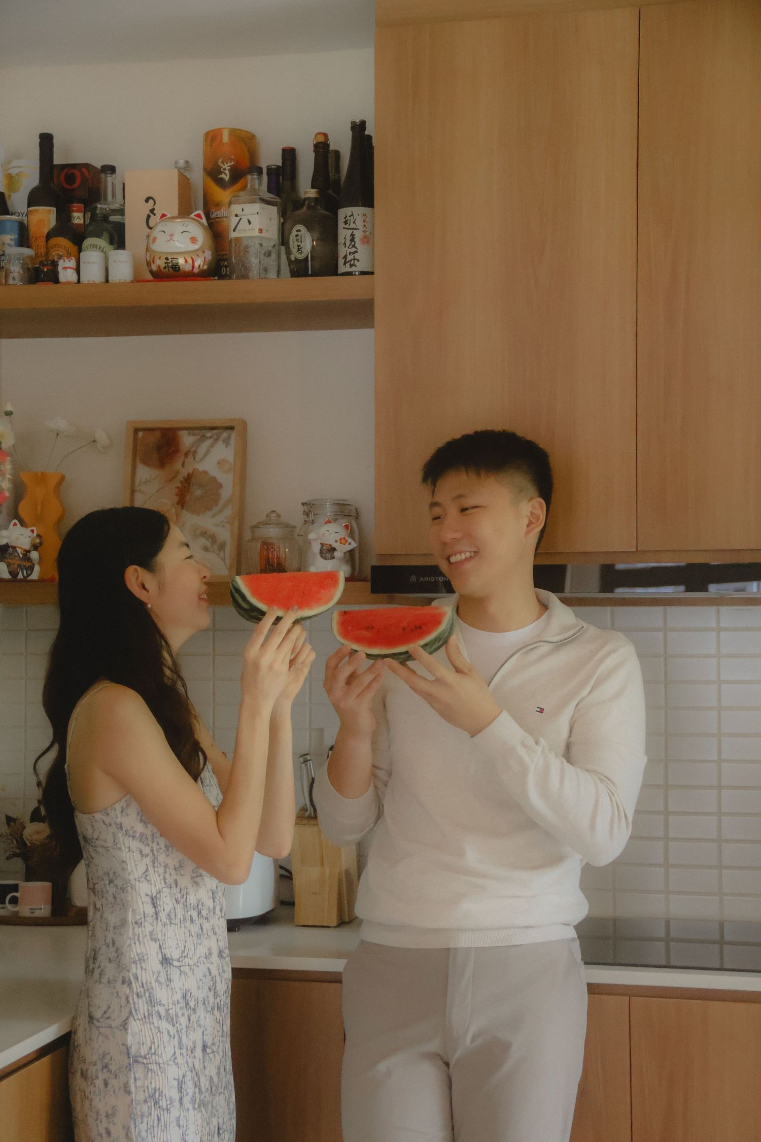 In-home couple photoshoot in Singapore with warm, natural light and storytelling focus