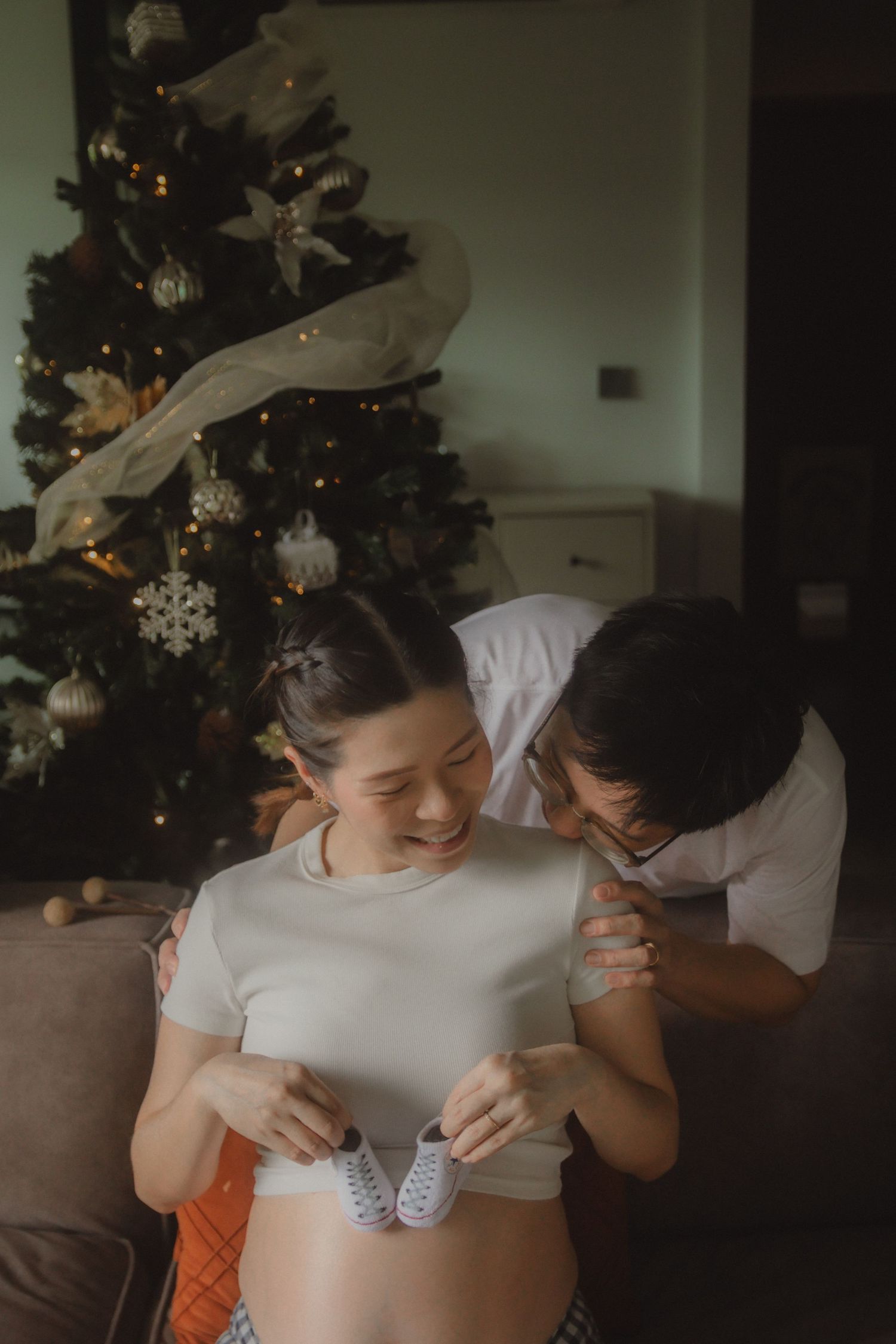 in-home maternity portrait photography in Singapore with natural light and emotional storytelling