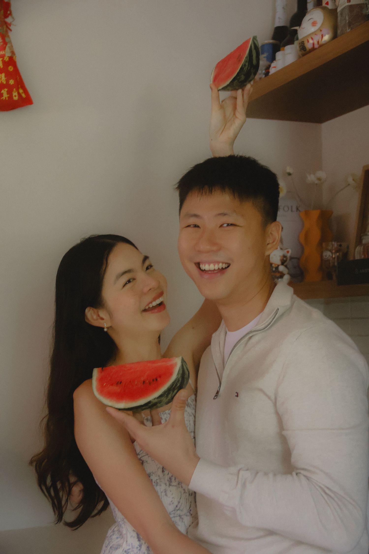 In-home couple photoshoot in Singapore with warm, natural light and storytelling focus