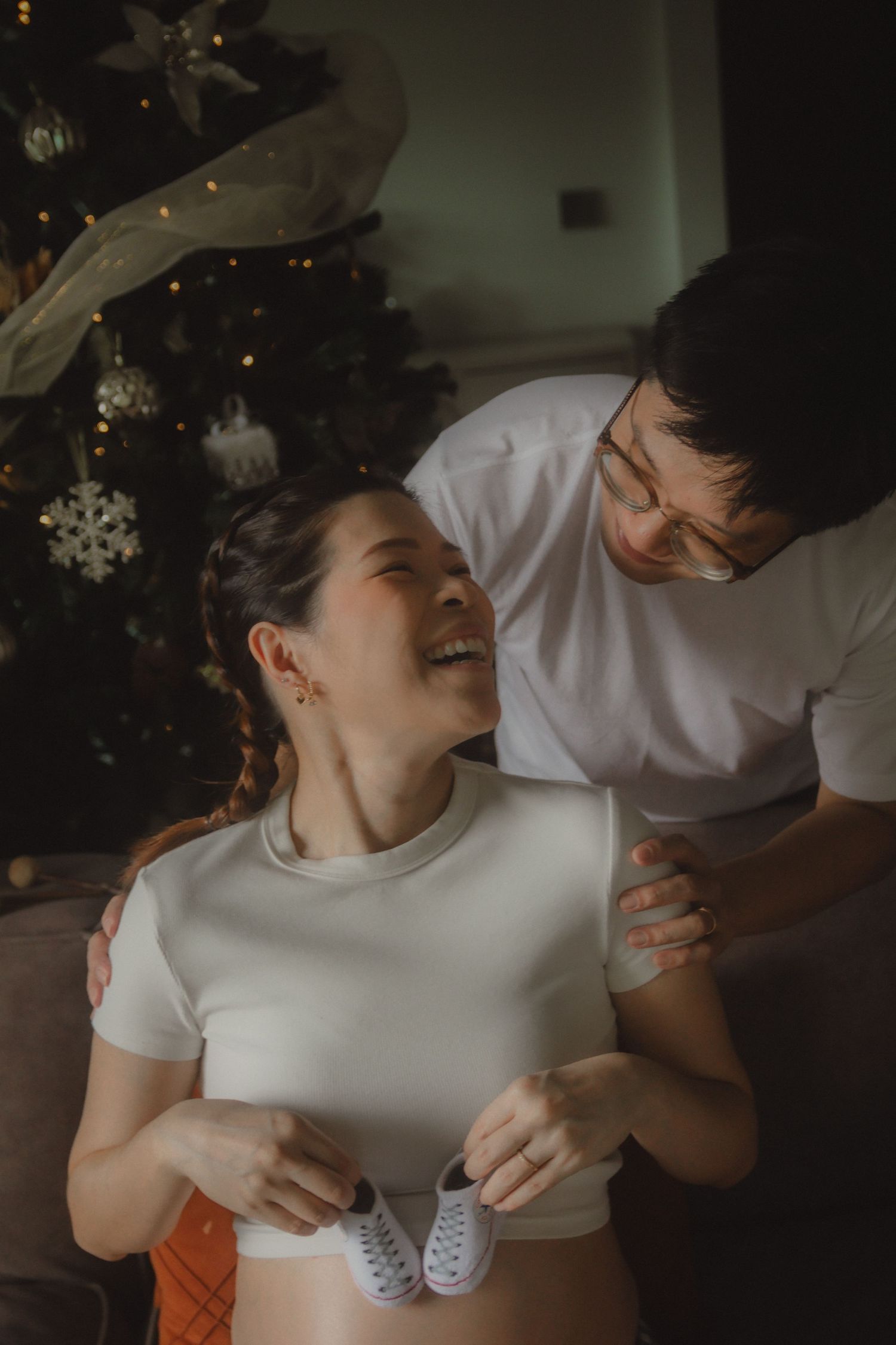 in-home maternity portrait photography in Singapore with natural light and emotional storytelling
