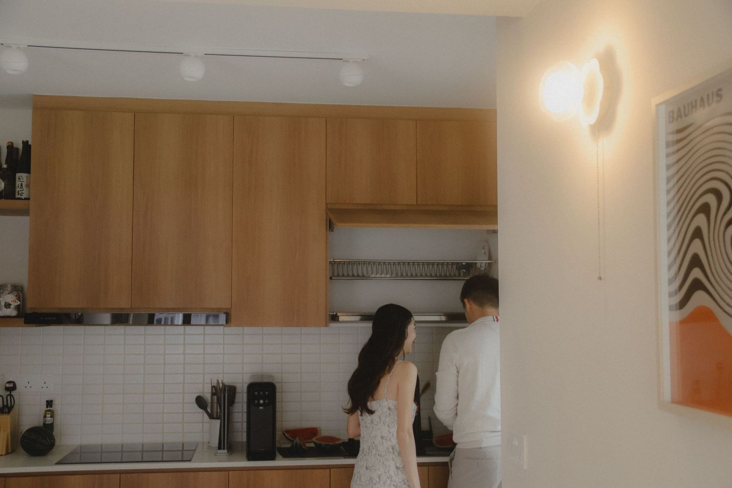 In-home couple photoshoot in Singapore with warm, natural light and storytelling focus