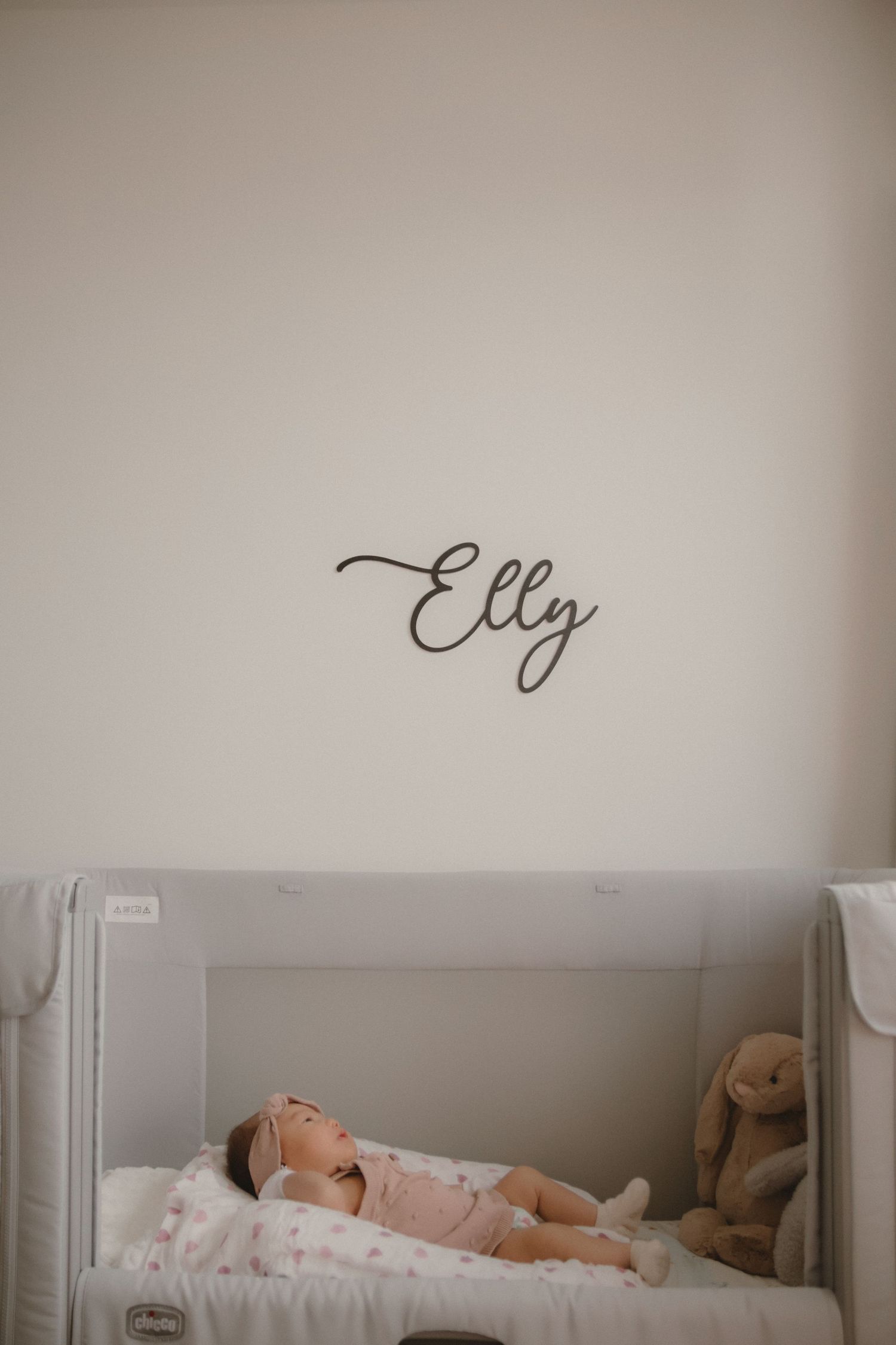 In-home newborn photography in Singapore documenting early days with soft natural light at home