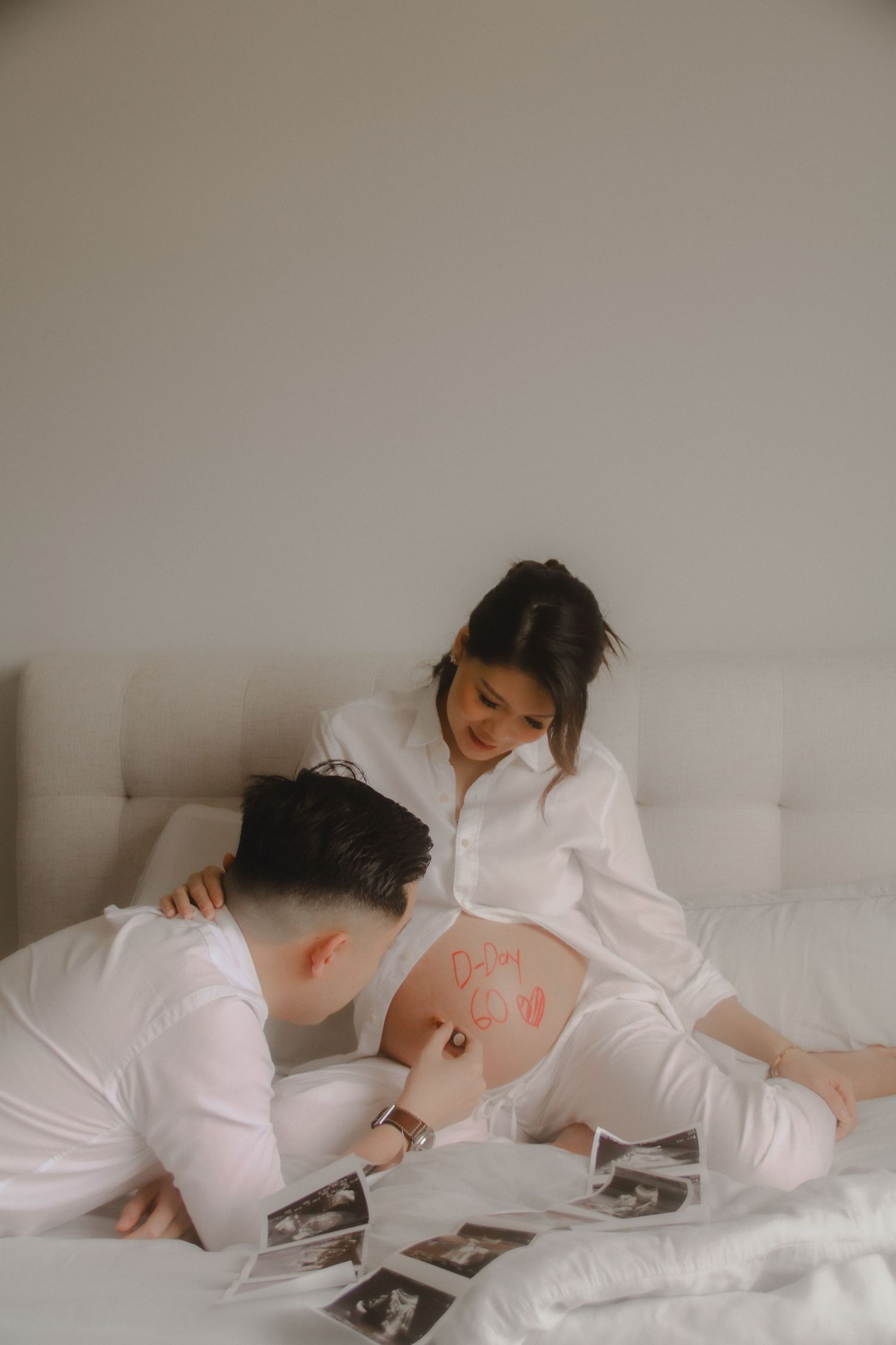 in-home maternity photography in Singapore with natural light and emotional storytelling