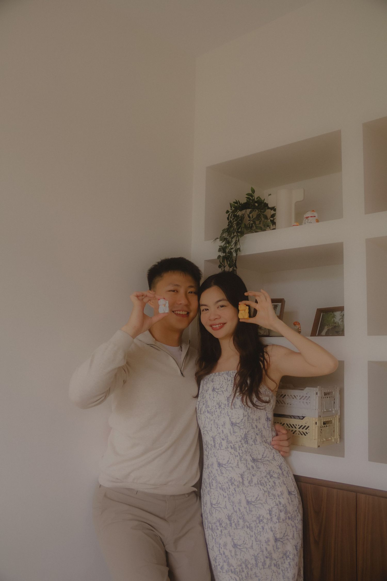 In-home couple photoshoot in Singapore with warm, natural light and storytelling focus