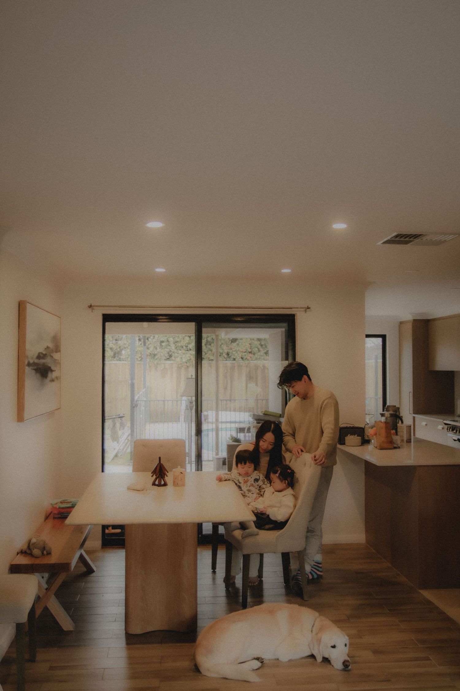 In-home family photoshoot in Singapore capturing candid moments between parents and children at home