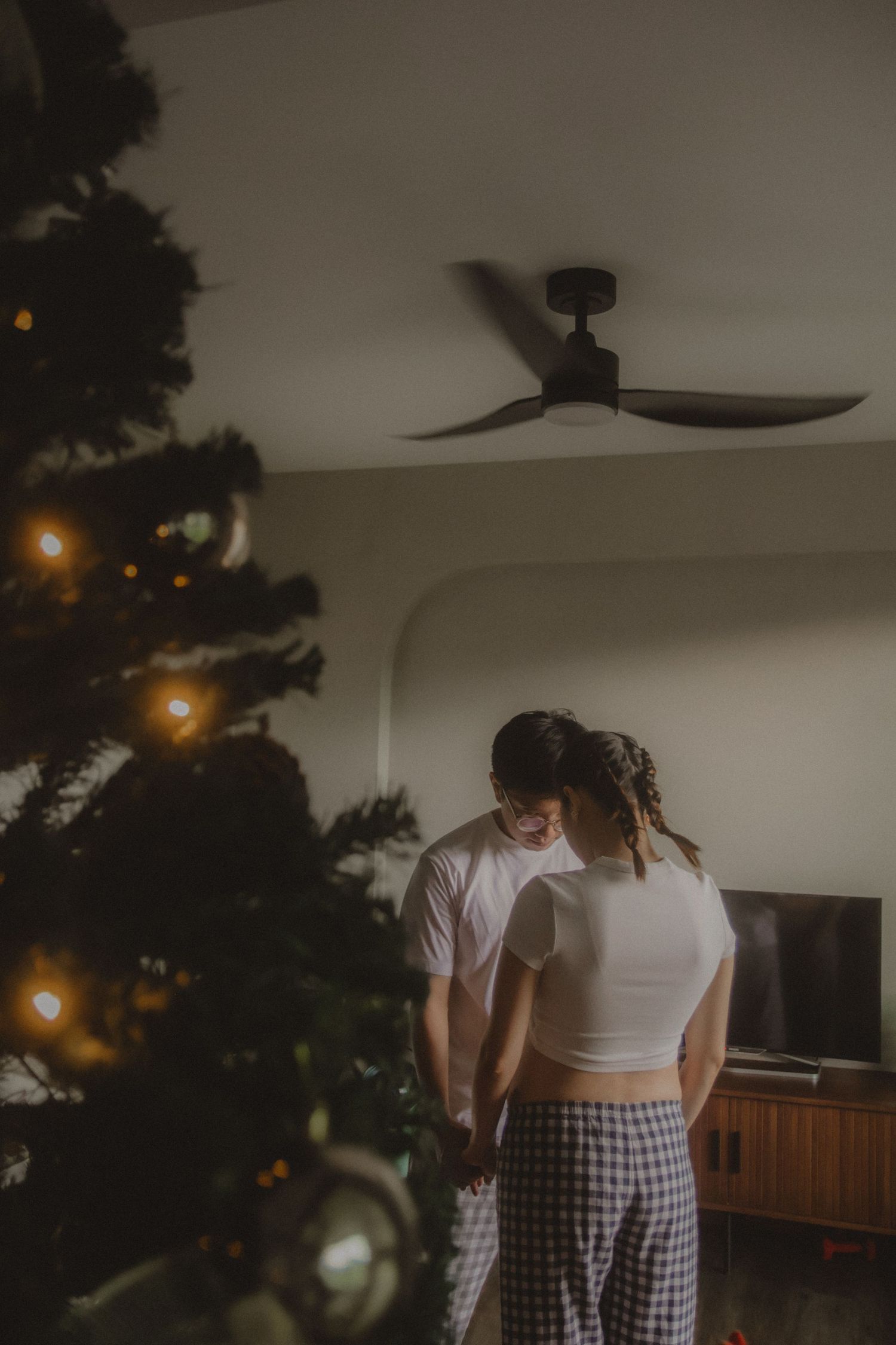 in-home maternity portrait photography in Singapore with natural light and emotional storytelling