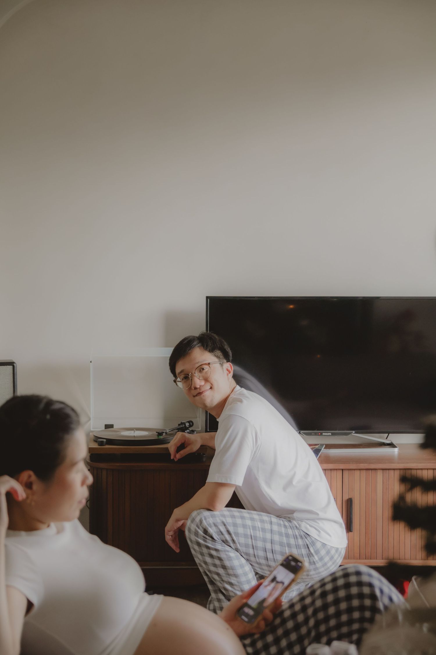 in-home maternity portrait photography in Singapore with natural light and emotional storytelling