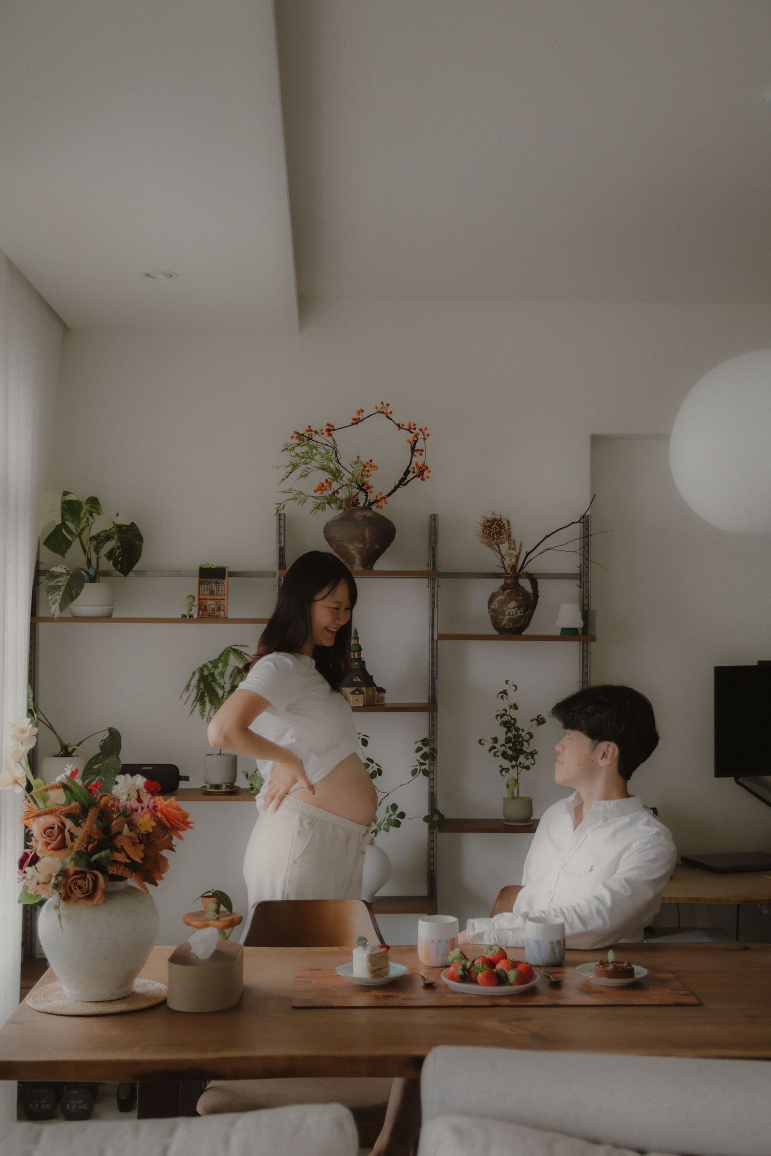 in-home maternity photography in Singapore with natural light and emotional storytelling