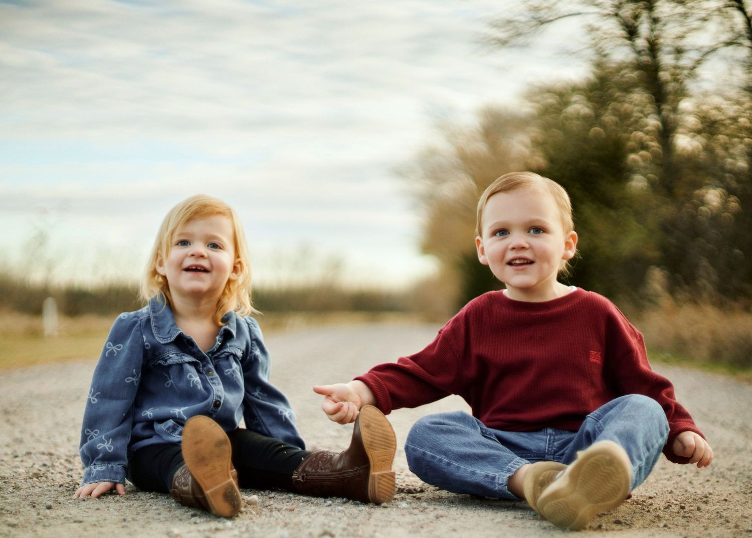 Close-up shots of tiny feet and shoes on a dirt path during an outdoor family photo session.