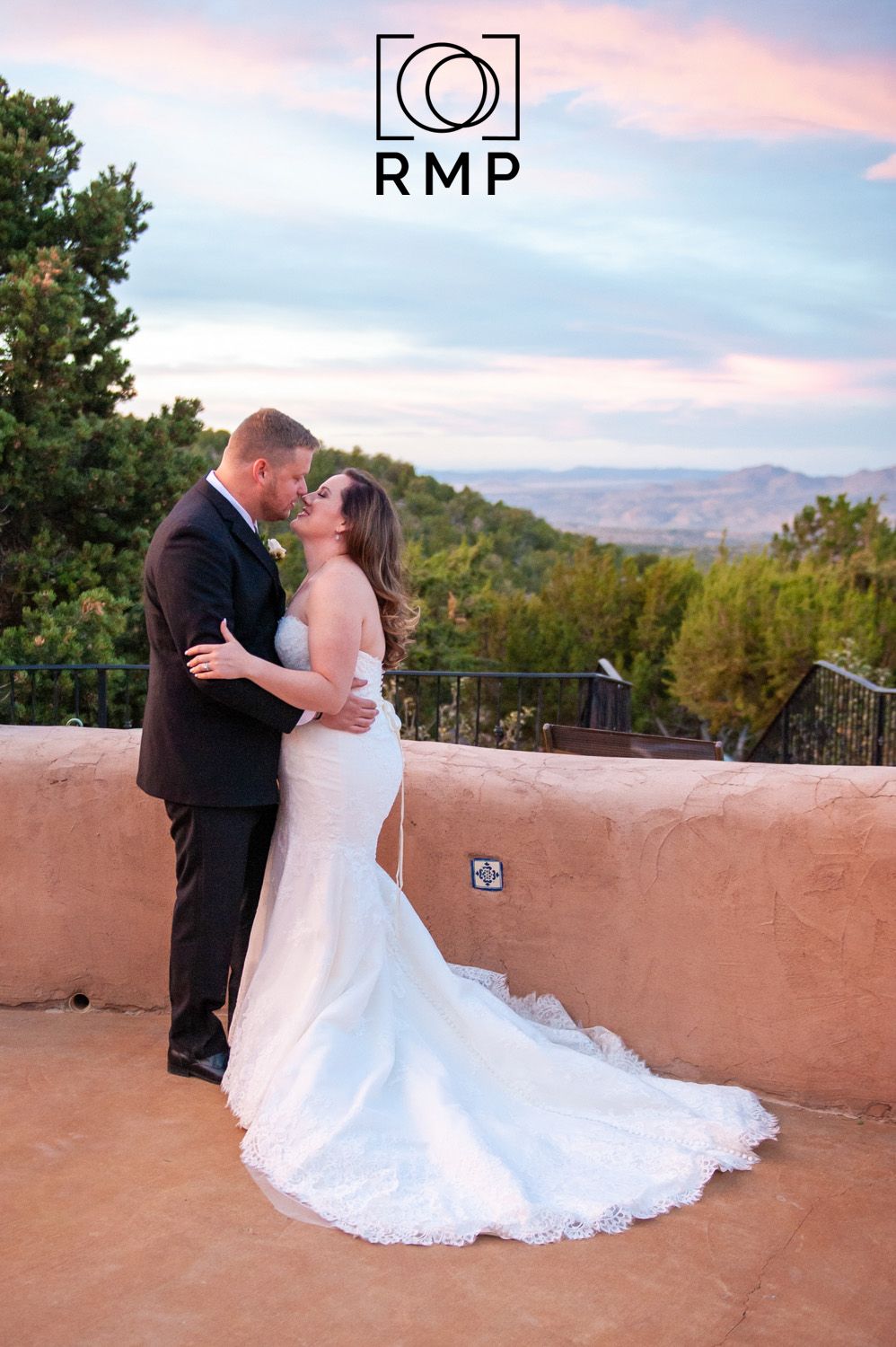 Hacienda Doña Andrea wedding in Santa Fe, New Mexico. Rachel Mares Photography. Sunset wedding photo of a couple kissing.