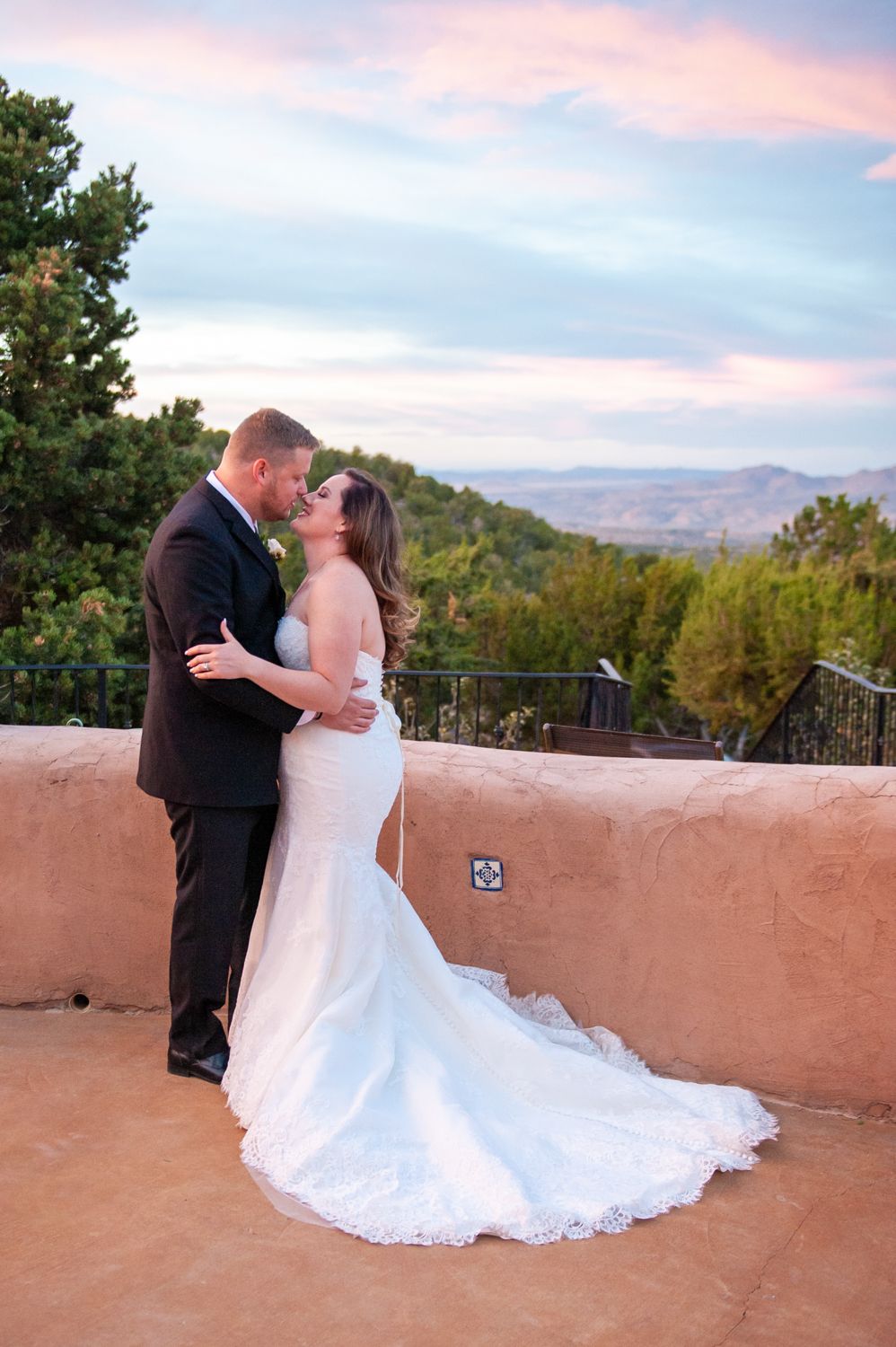 Santa Fe, New Mexico wedding couple kissing at sunset. Rachel Mares Photography New Mexico and Destination Photographer