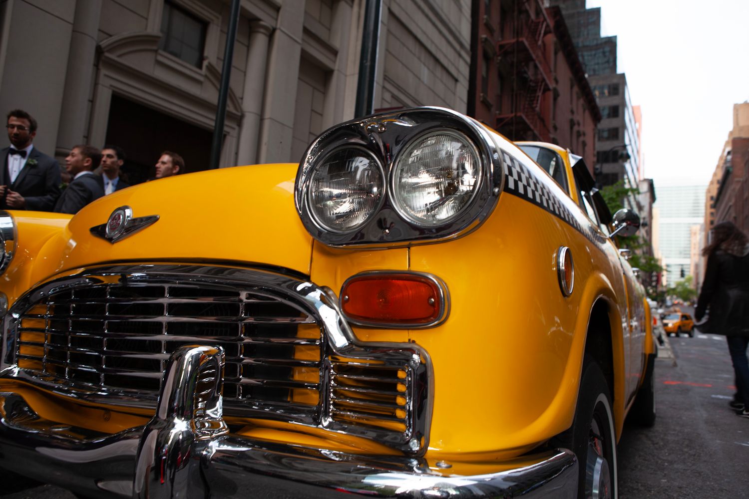 Vintage yellow taxi cabs photographed from various artistic angles on city streets.
