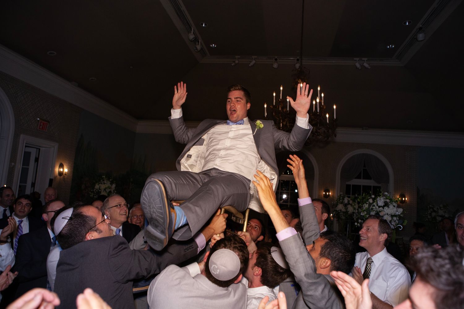 Guests dancing and enjoying a high-energy celebration at a wedding reception.