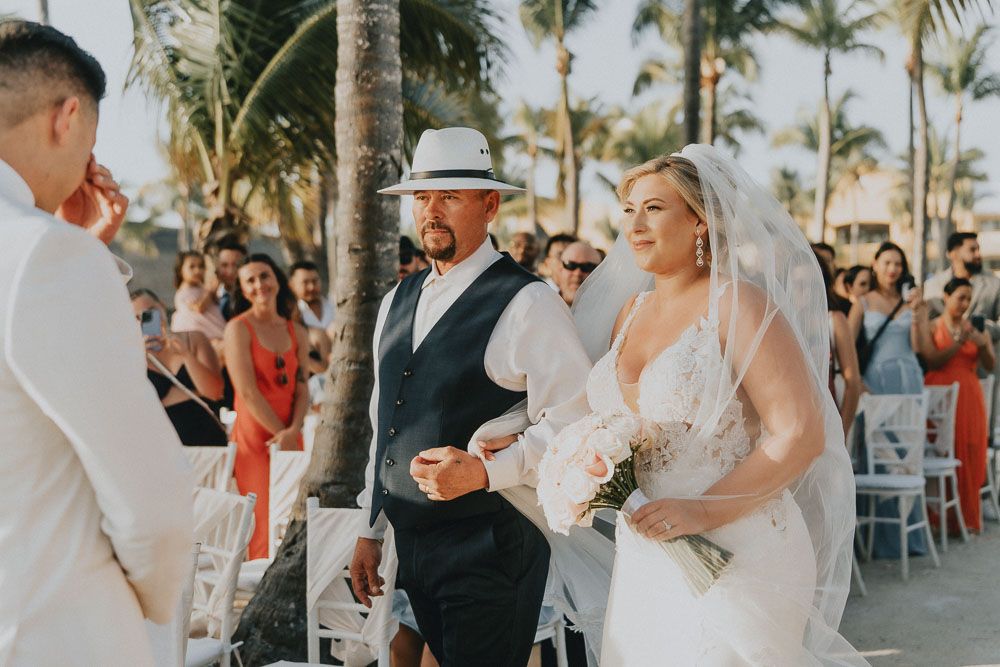 Wedding celebration photos at a tropical venue with palm trees and outdoor seating.