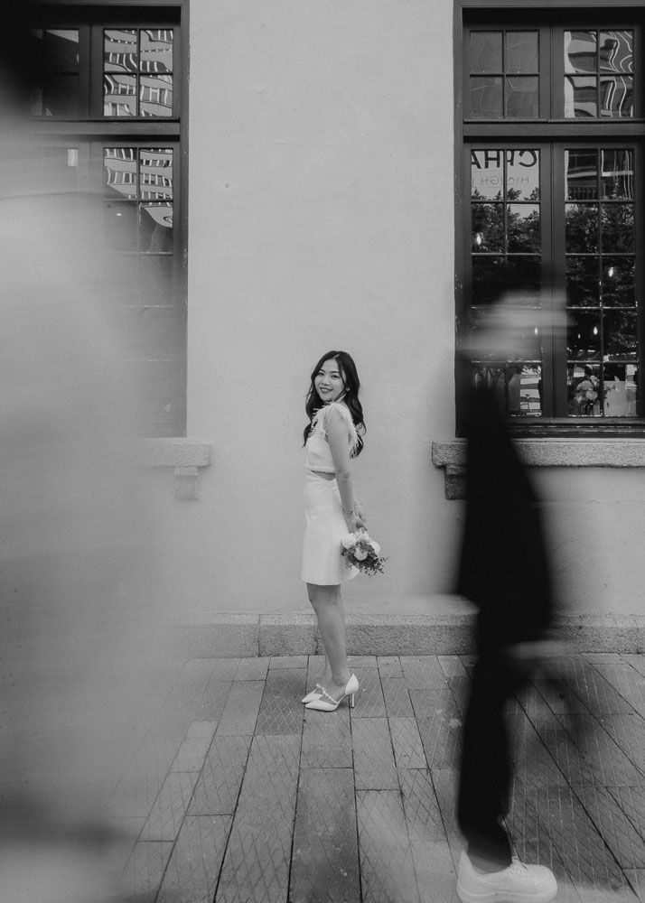 A creative sequence of motion blur shots against a white wall showing movement and passing time.