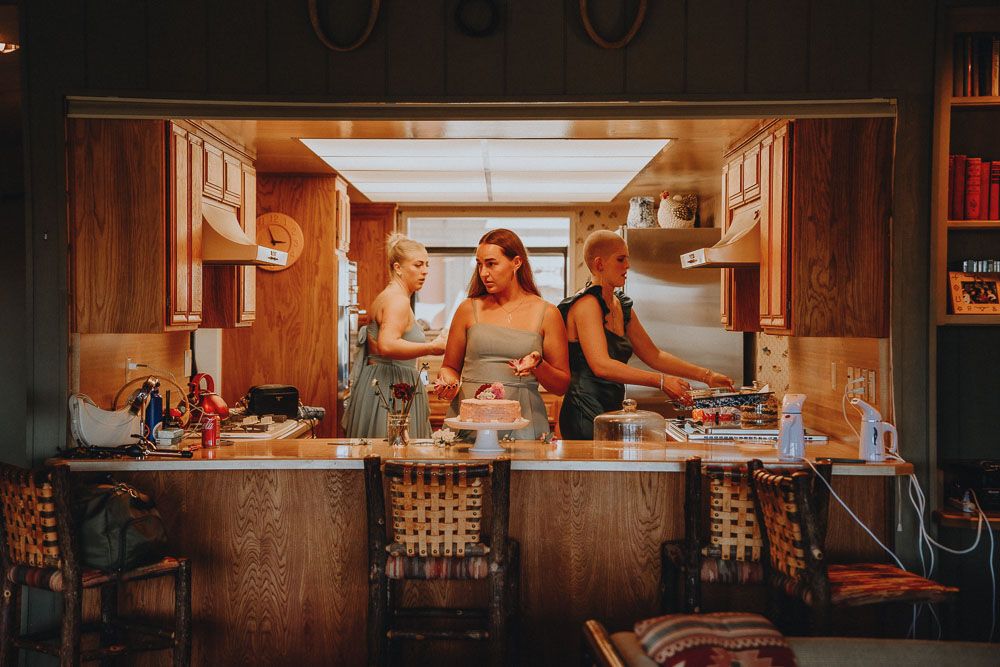 Interior shots of a rustic wooden room with warm lighting and dining setup.