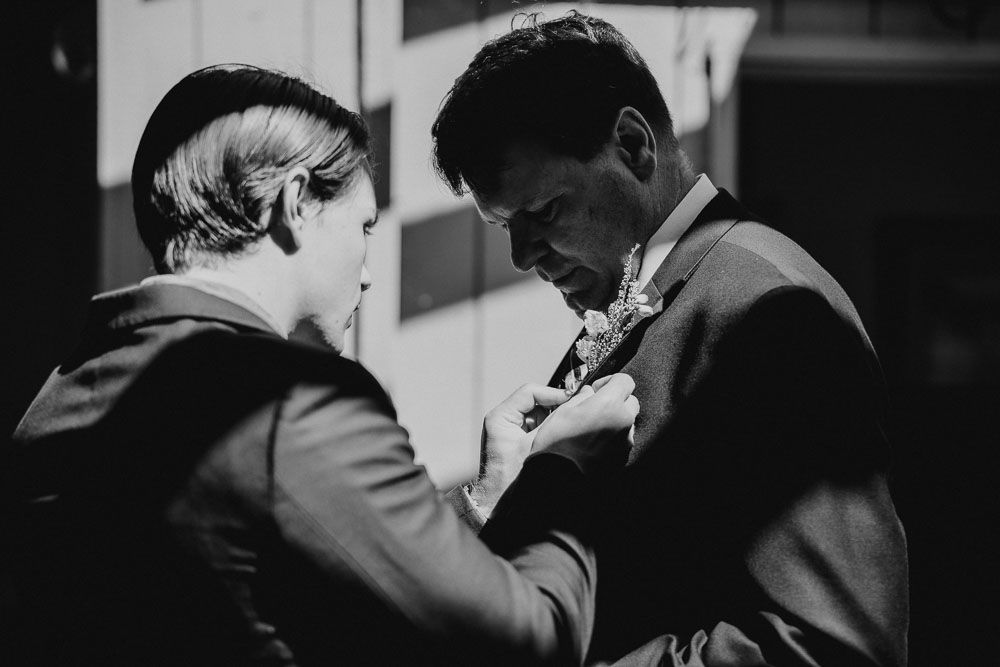Intimate black and white moments captured during wedding ceremony.