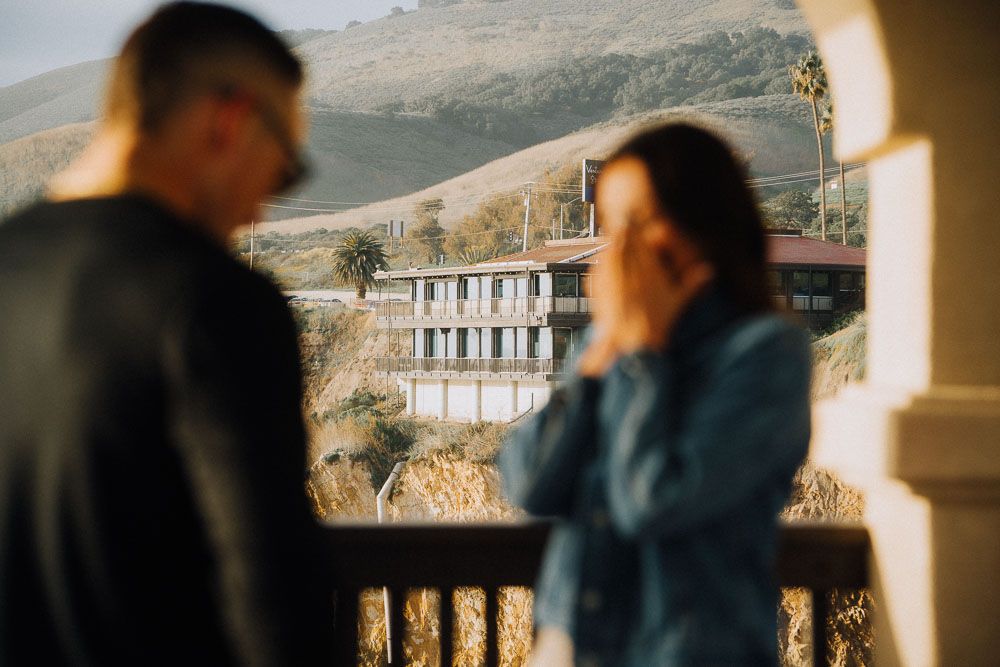 Series of photos showing romantic moments on a scenic mountain balcony.
