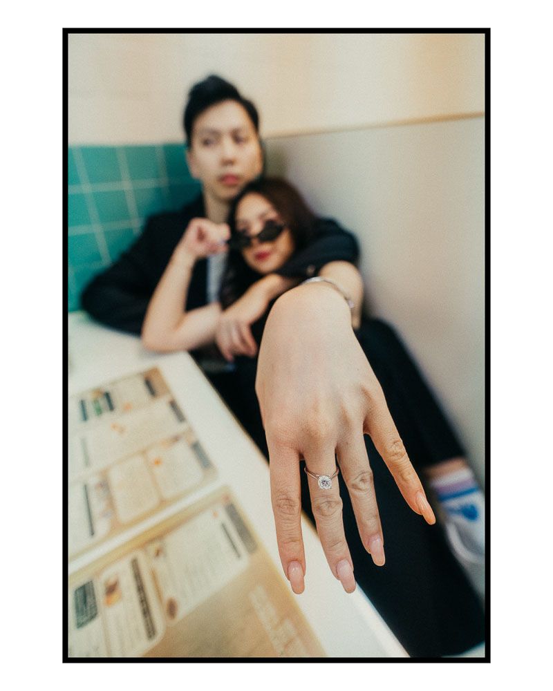 Close-up shots focusing on a diamond engagement ring display.