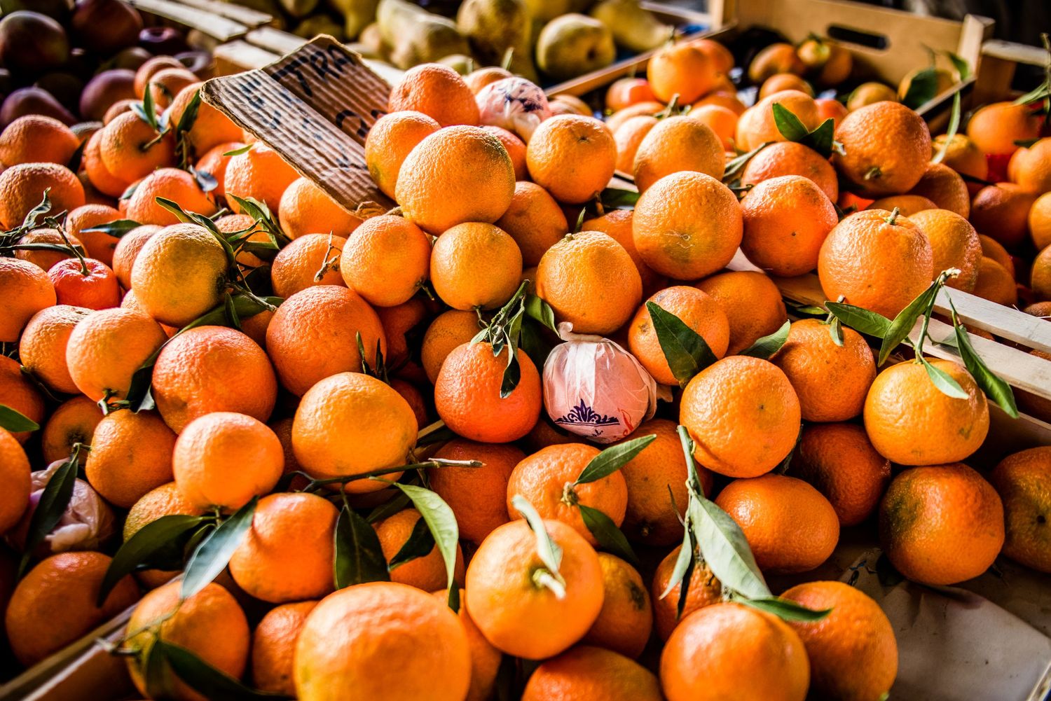 Fresh oranges in Italian market. Photographed by Inspired Eye Photography.