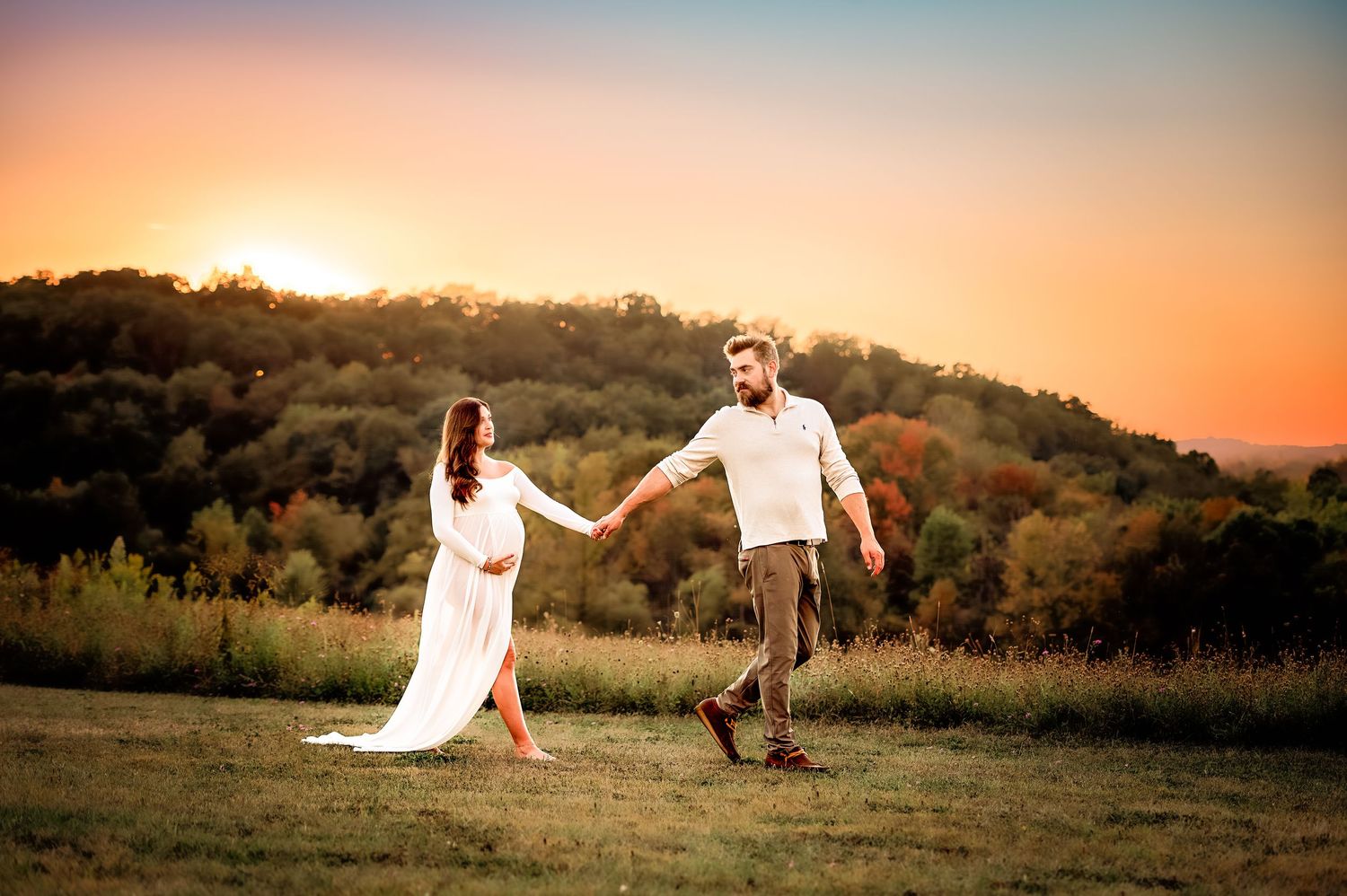 Panoramic sunset photography session in natural outdoor setting.