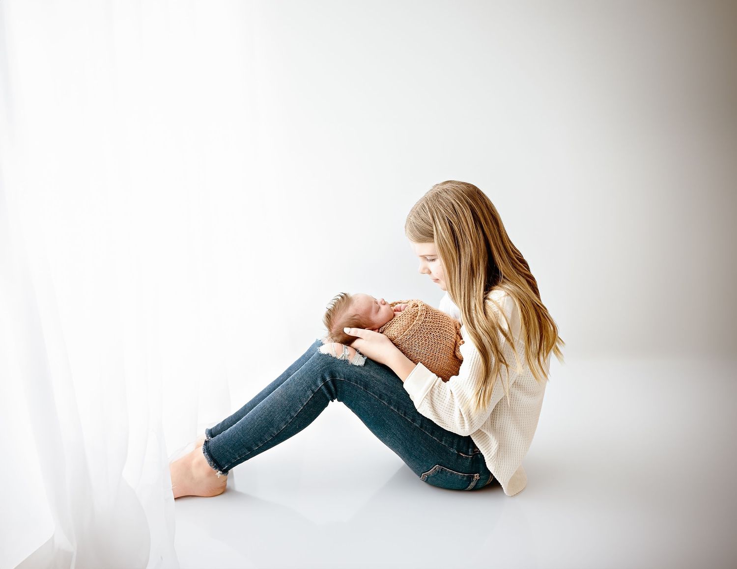 Artistic minimalist photo series showing person in relaxed poses against white background.