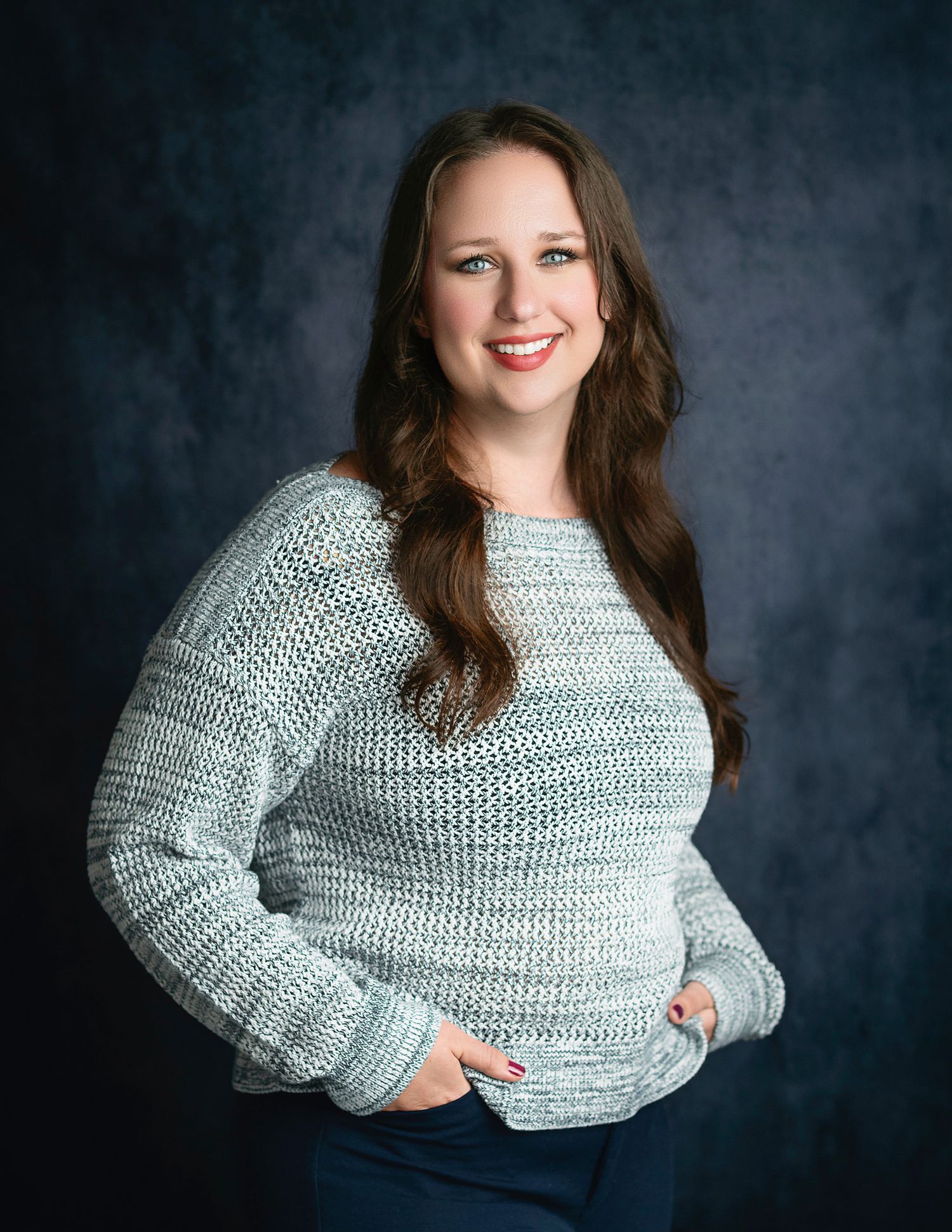 Studio portrait series showing a person in a gray knit sweater against a dark backdrop.