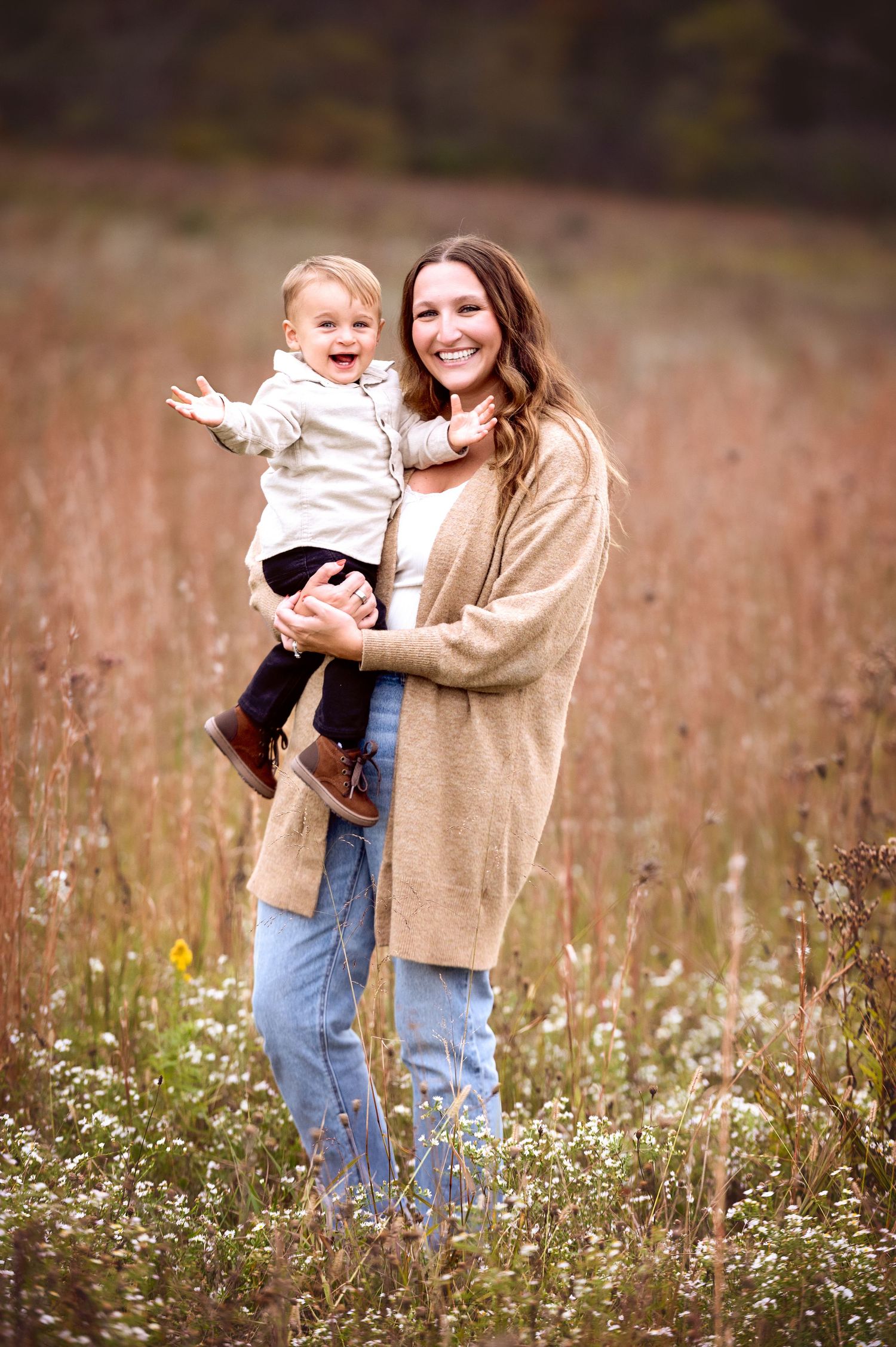 Natural outdoor portrait in wildflower field showing joy and connection.