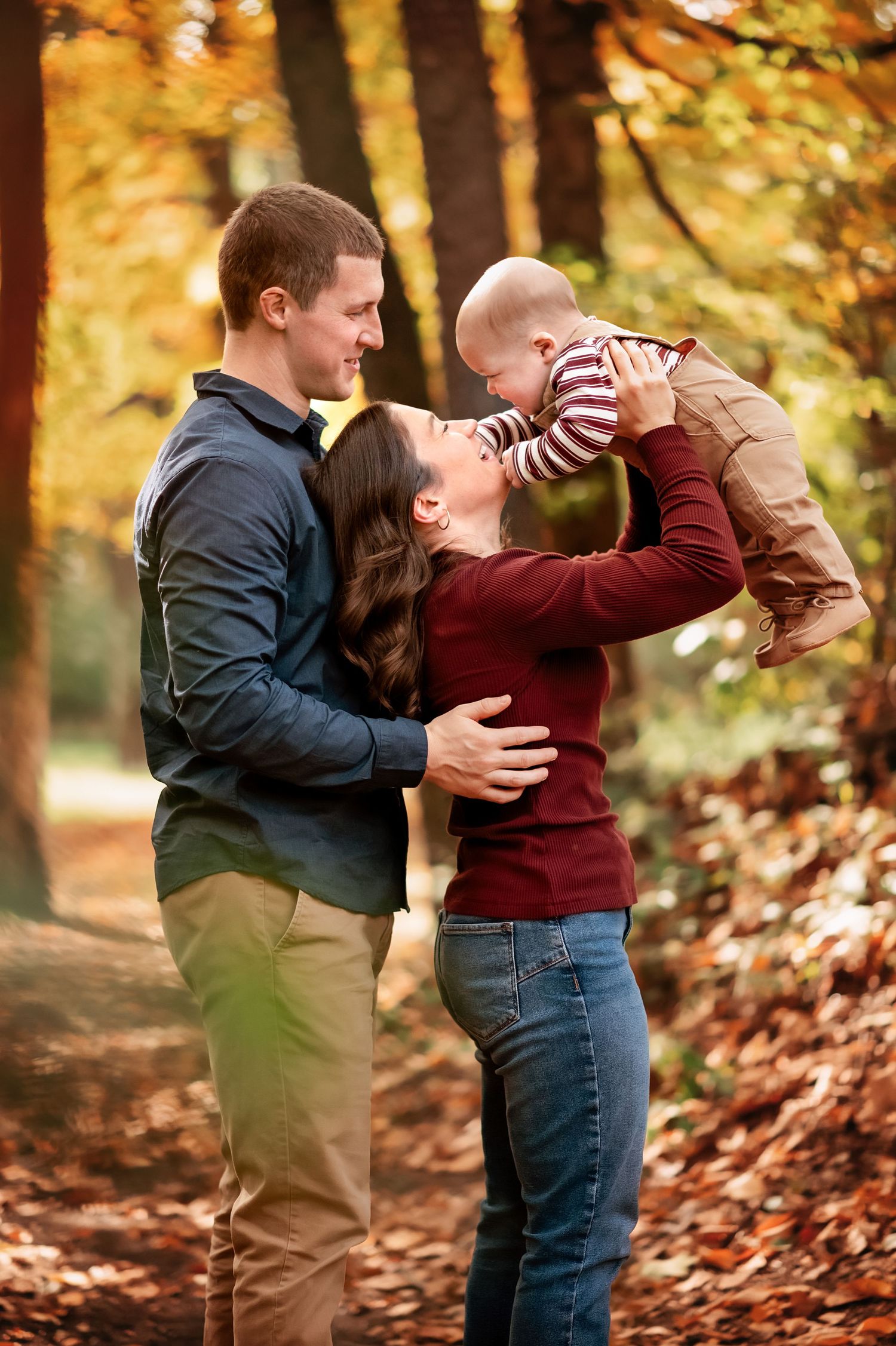 Candid sequence showing affectionate family moments against a backdrop of fall foliage.