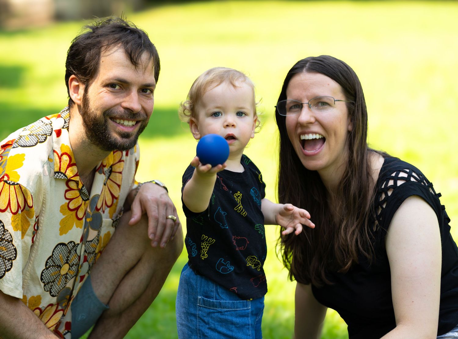 Candid outdoor portrait series showing joyful interactions and laughter in a natural setting.