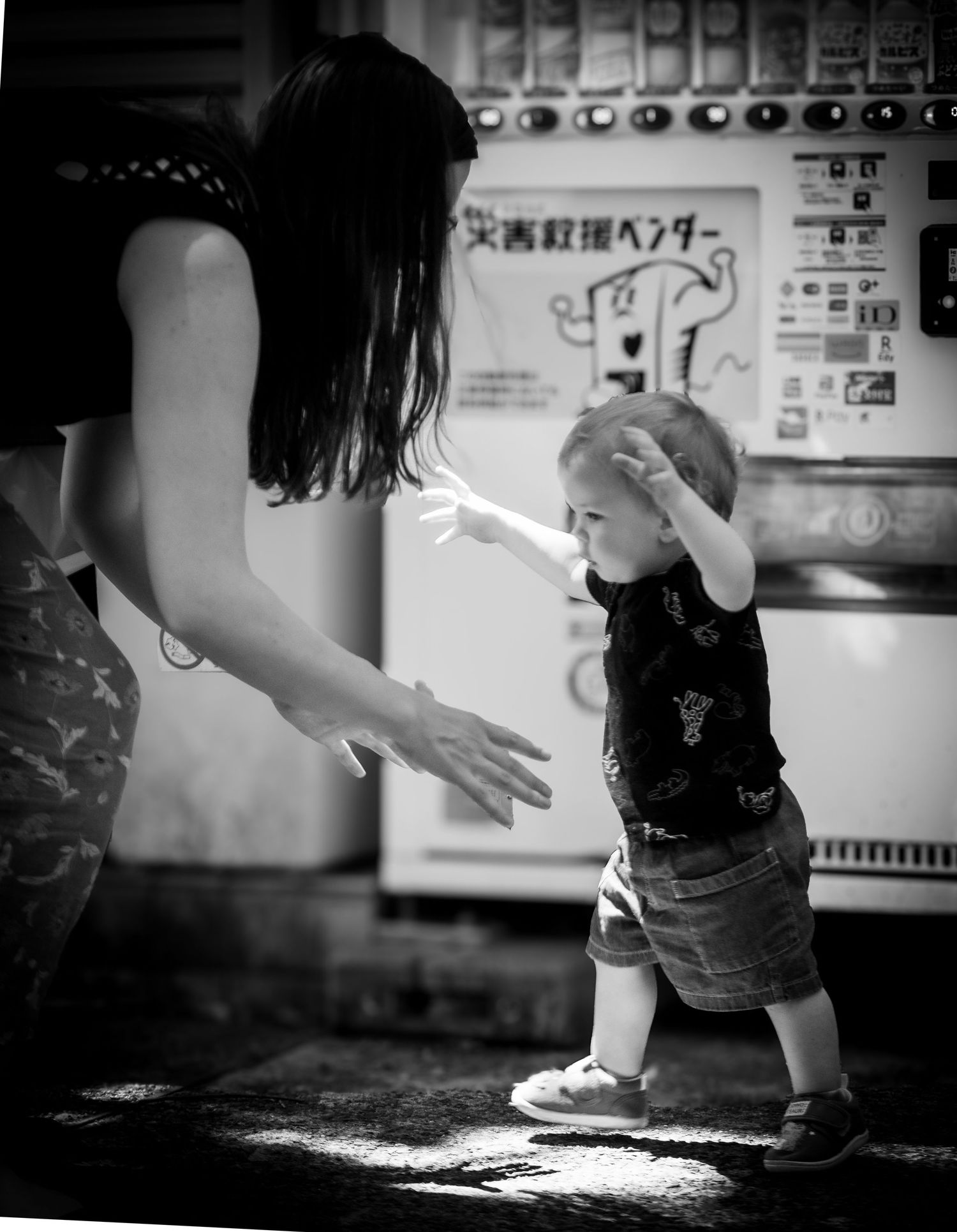 A series of black and white photos showing hands kneading and working with dough on a floured surface.
