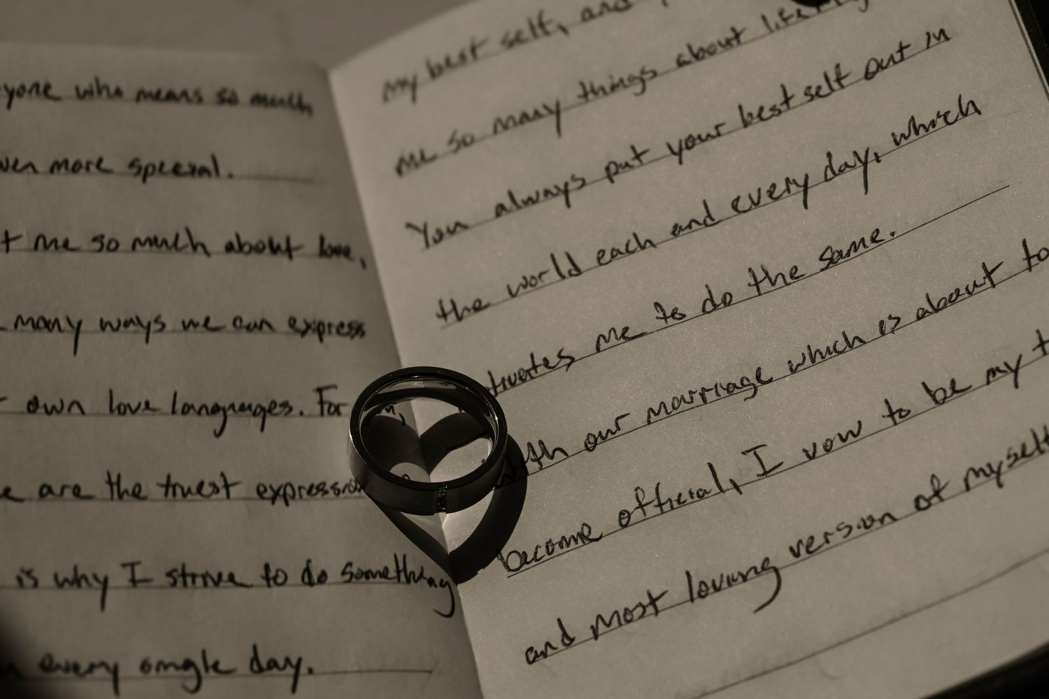 A handwritten note with a heart-shaped drawing on the page.