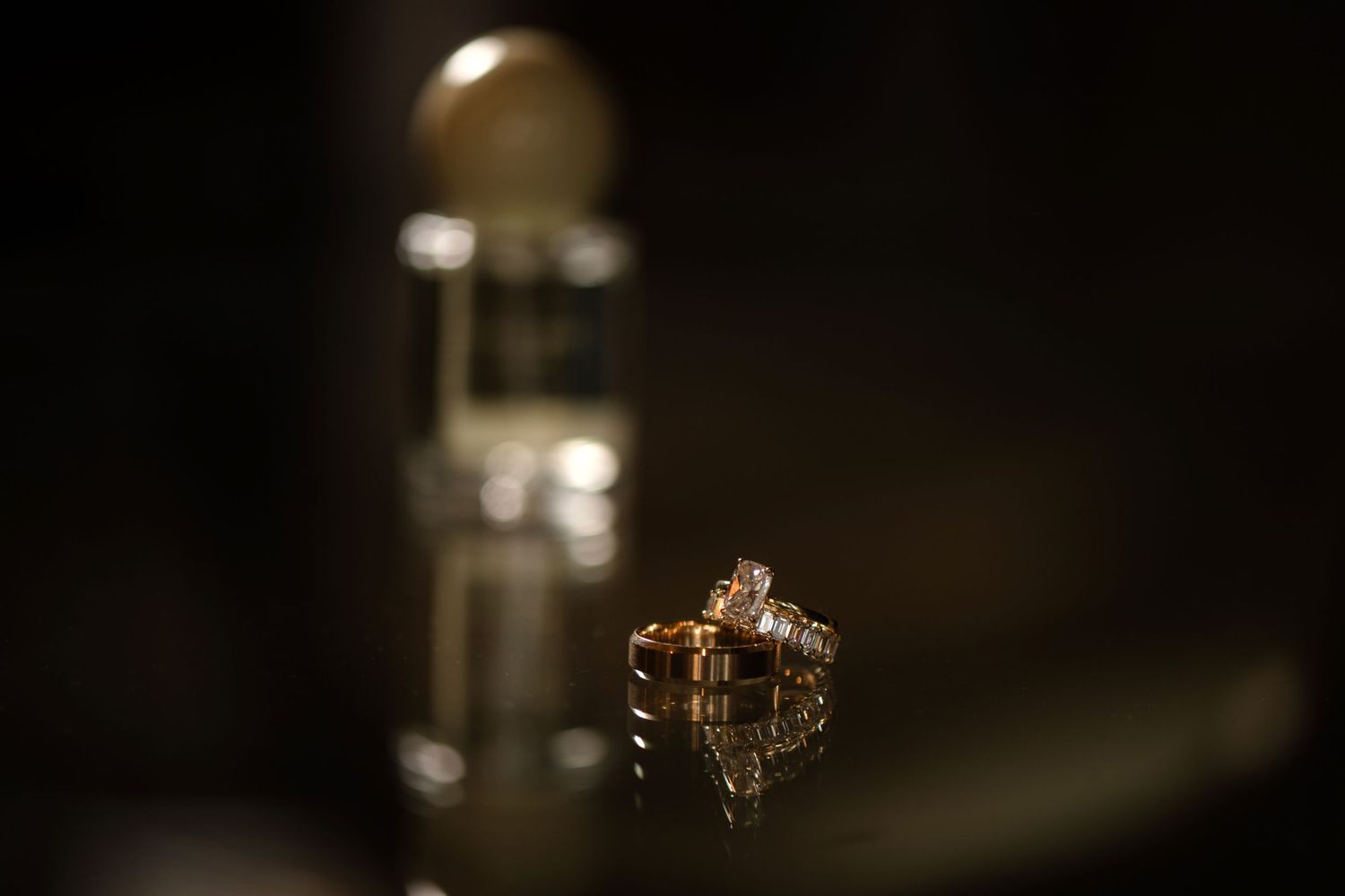 A close-up view of a crystal or gemstone on a dark background.