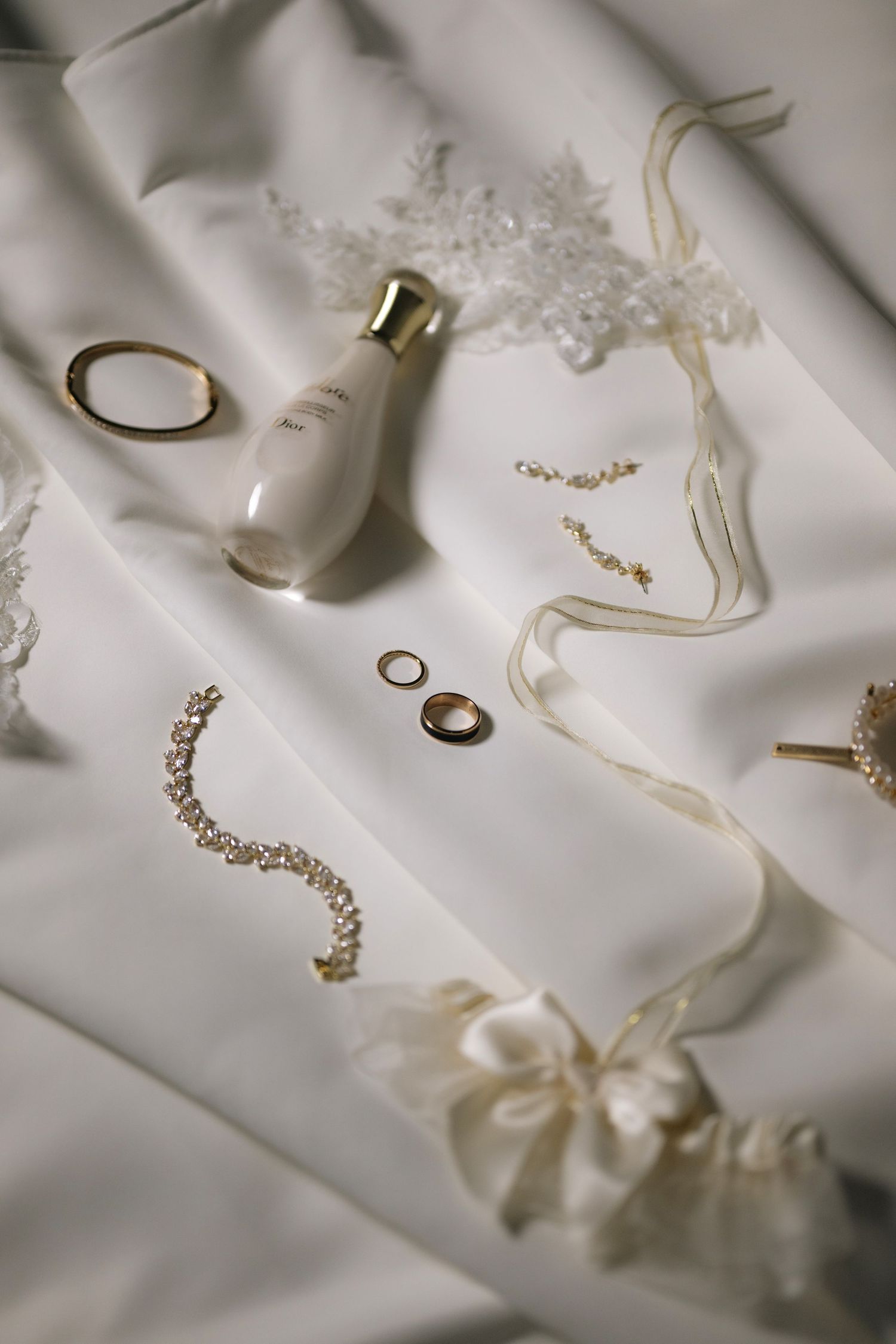 Various wedding accessories and decorations on a table.