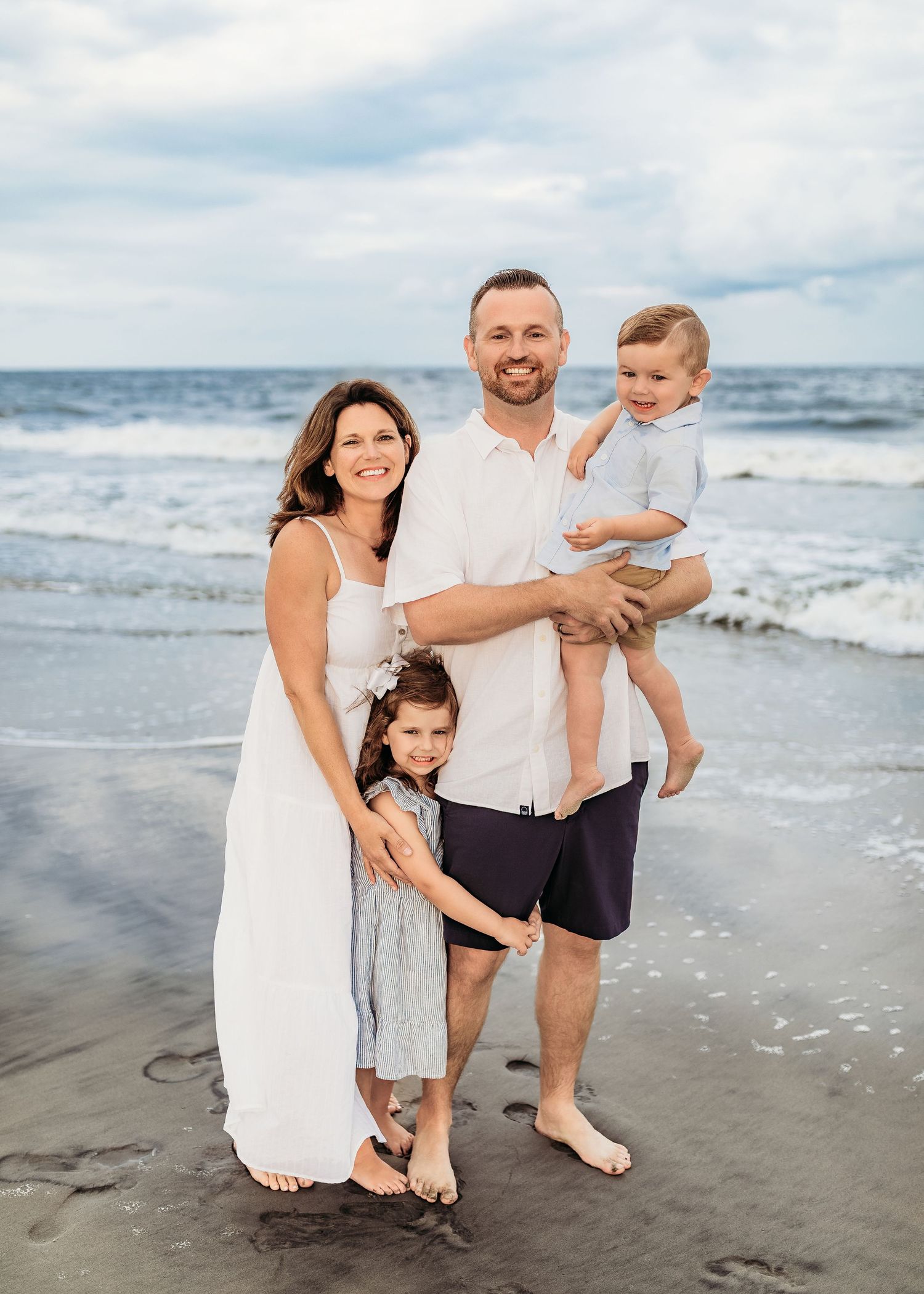 Family of four during a beach session in Ocean City, NJ.