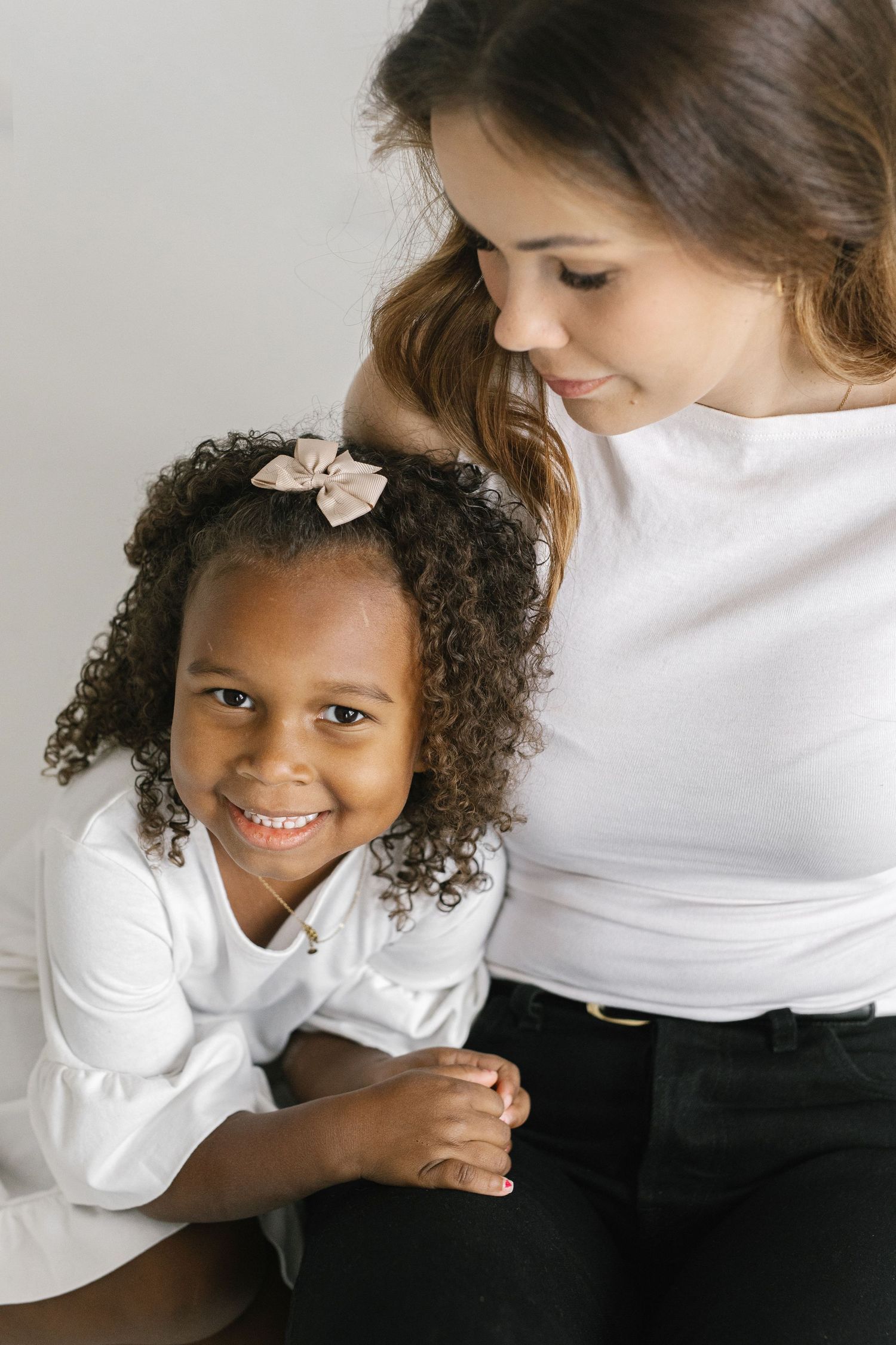 Sweet candid moments captured in a series of intimate portrait poses.