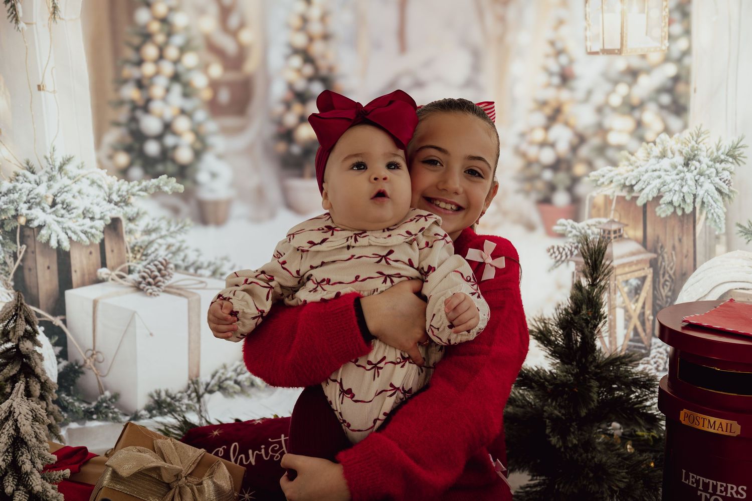 A cozy Christmas scene with red and white decor, wrapped presents, and festive holiday decorations.