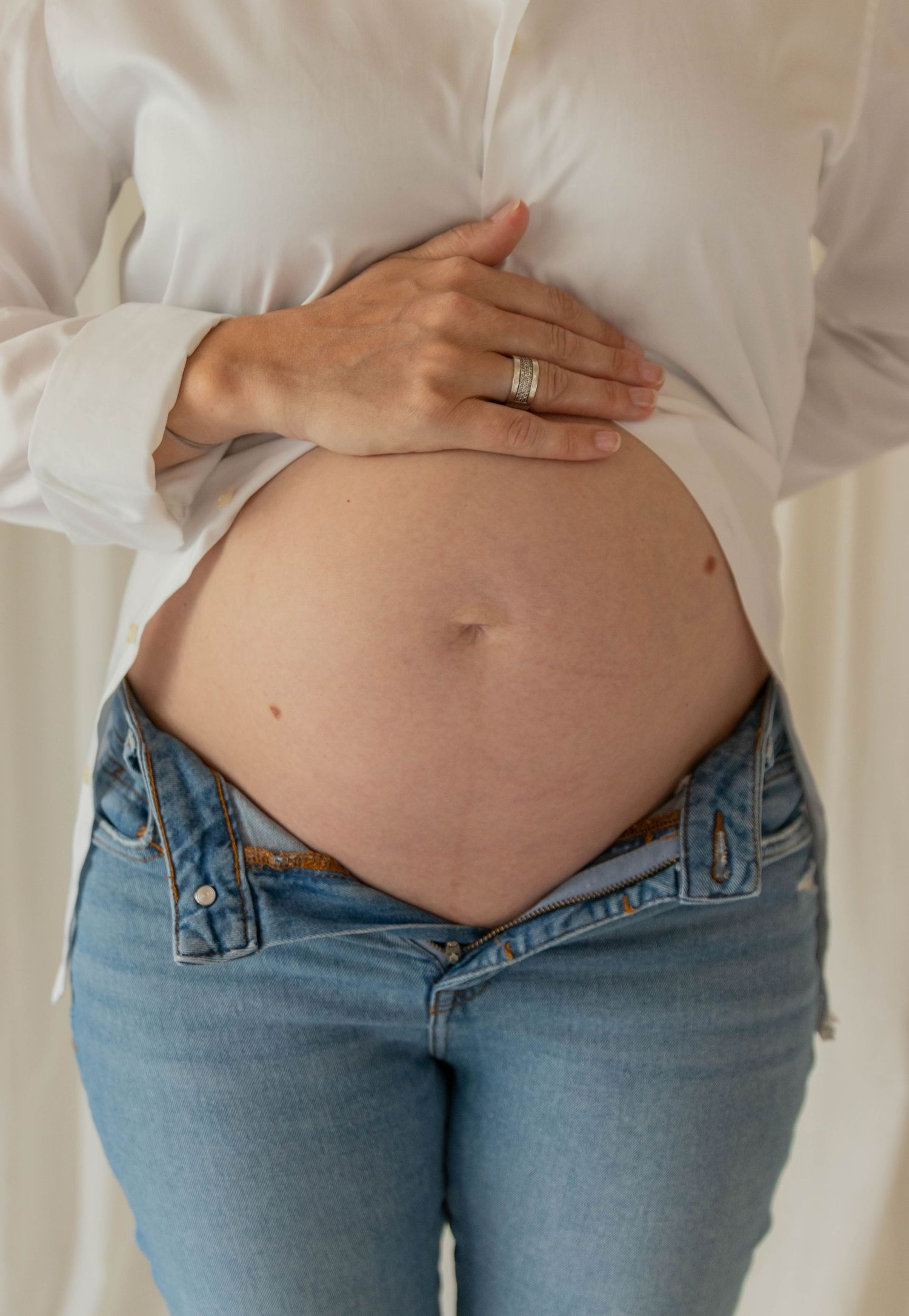 A close up of a pregnant belly