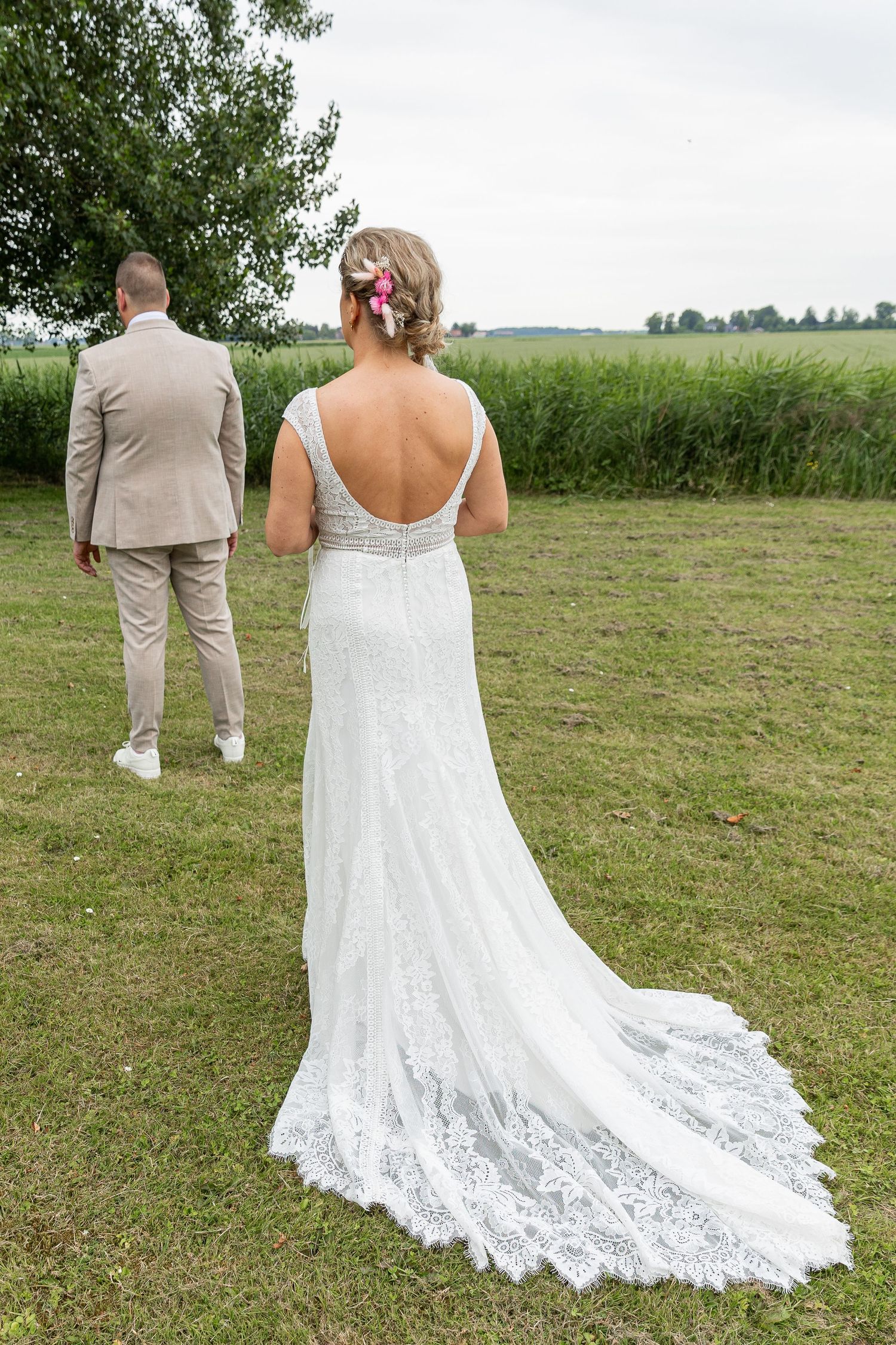 The first look of the bride and groom during the wedding day