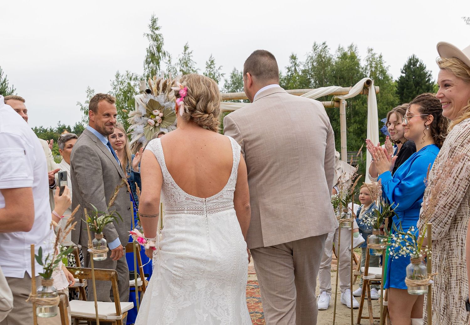 The bride and groom walking down the aisle
