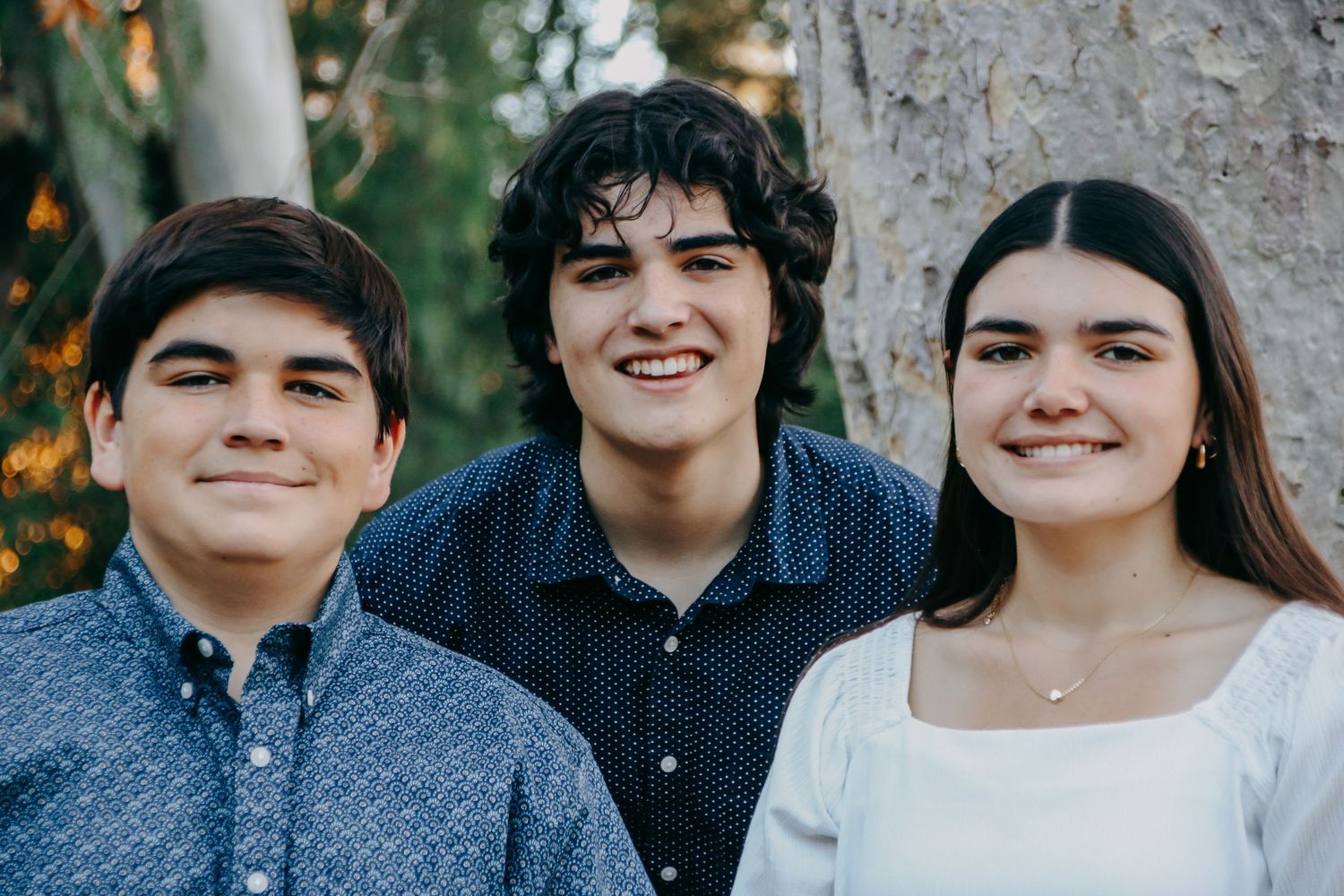 Candid family photo series showing natural expressions and smiles.