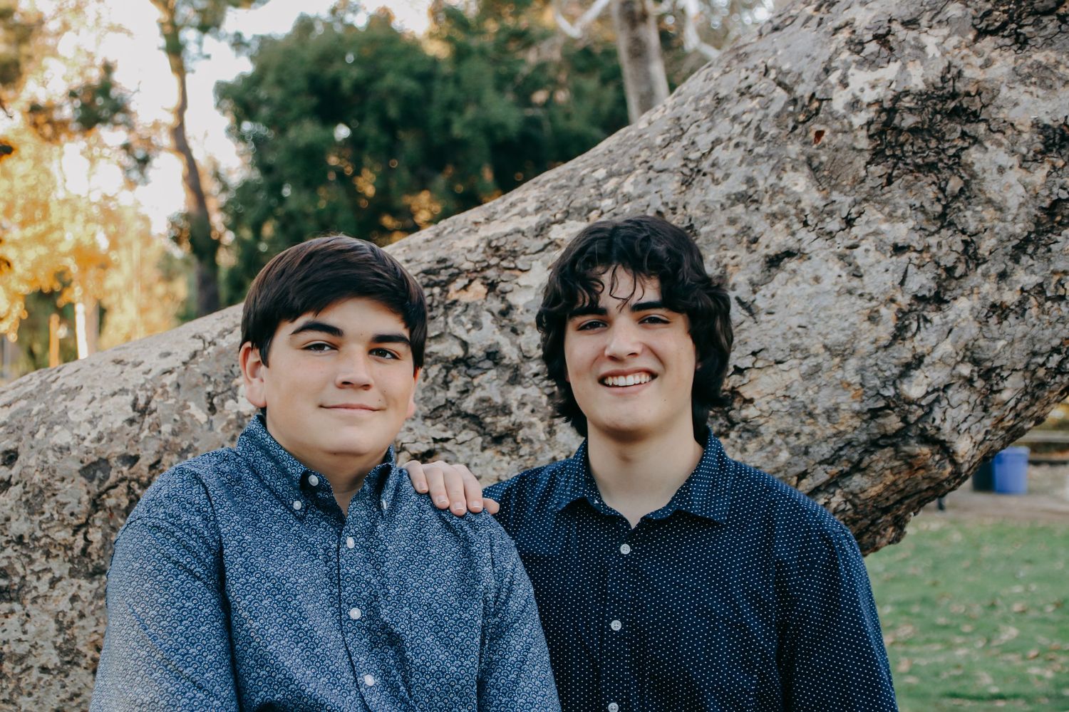 Casual outdoor portraits with golden hour lighting and natural scenery.