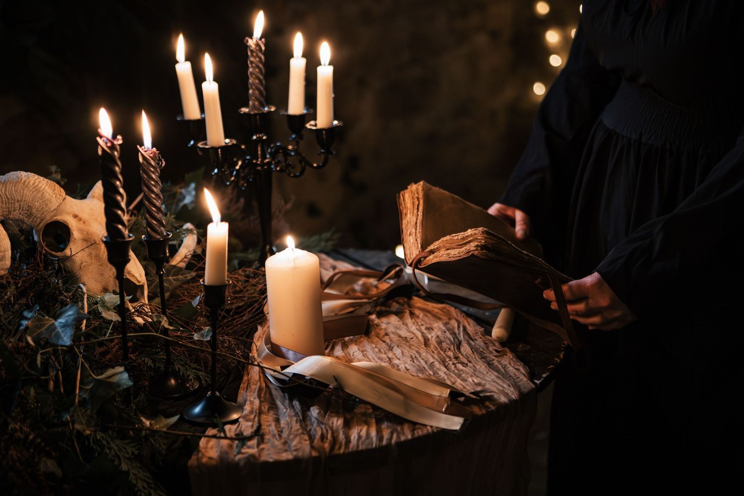 Dark gothic altar with candelabra, skull, and antique book surrounded by dramatic candlelight in moody setting.