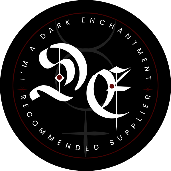 A circular black logo with gothic white lettering 'DE' and text 'I'm a Dark Enchantment Recommended Supplier' around the edge.